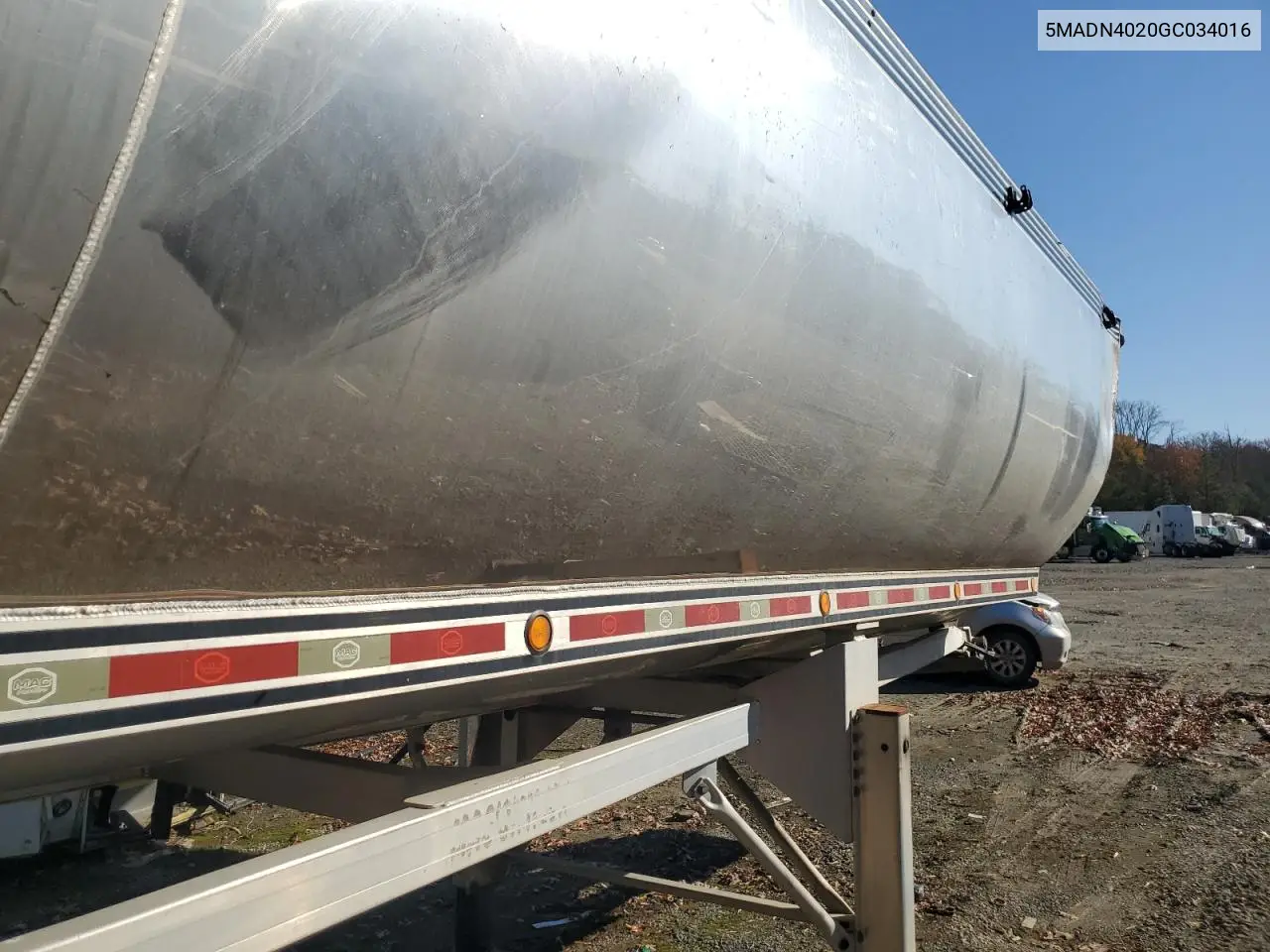 2016 Mac End Dump Trailer VIN: 5MADN4020GC034016 Lot: 91054835