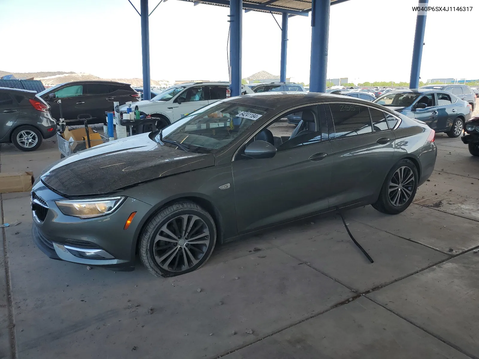 2018 Buick Regal Essence VIN: W04GP6SX4J1146317 Lot: 64241184