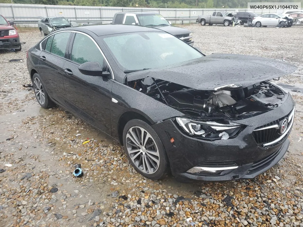 2018 Buick Regal Essence VIN: W04GP6SX1J1044702 Lot: 73102654