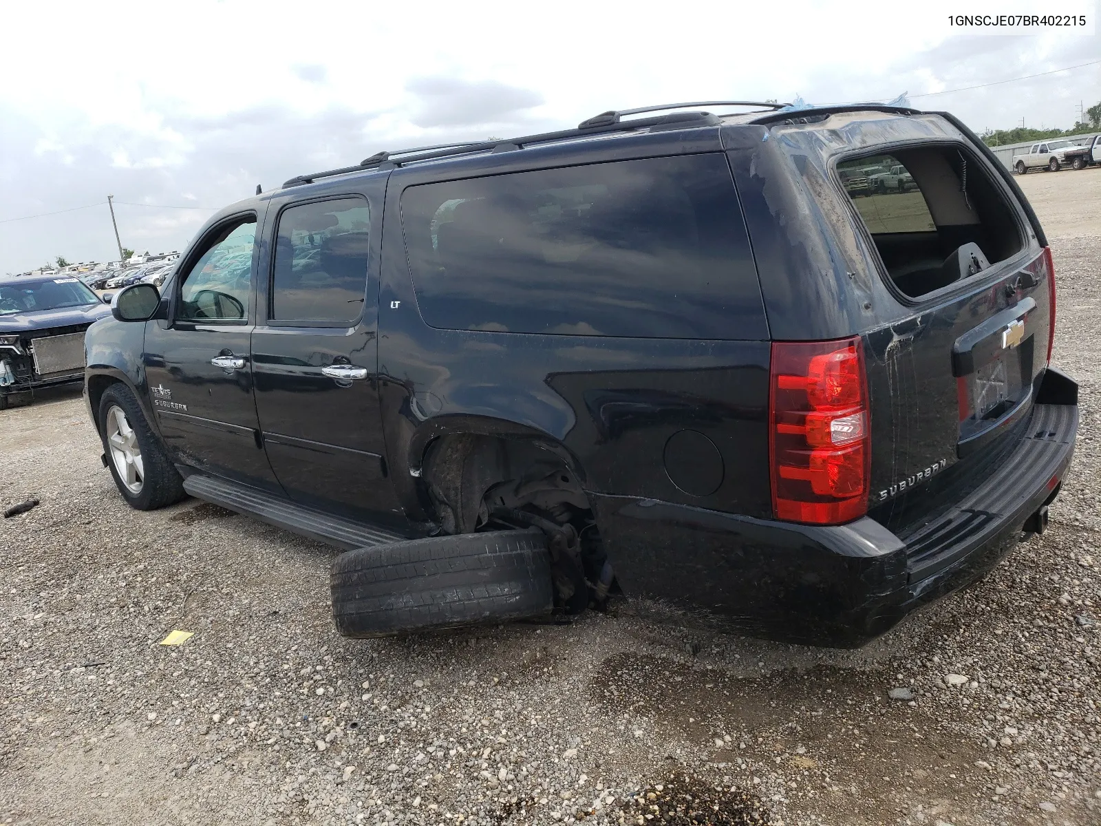 2011 Chevrolet Suburban C1500 Lt VIN: 1GNSCJE07BR402215 Lot: 58649854