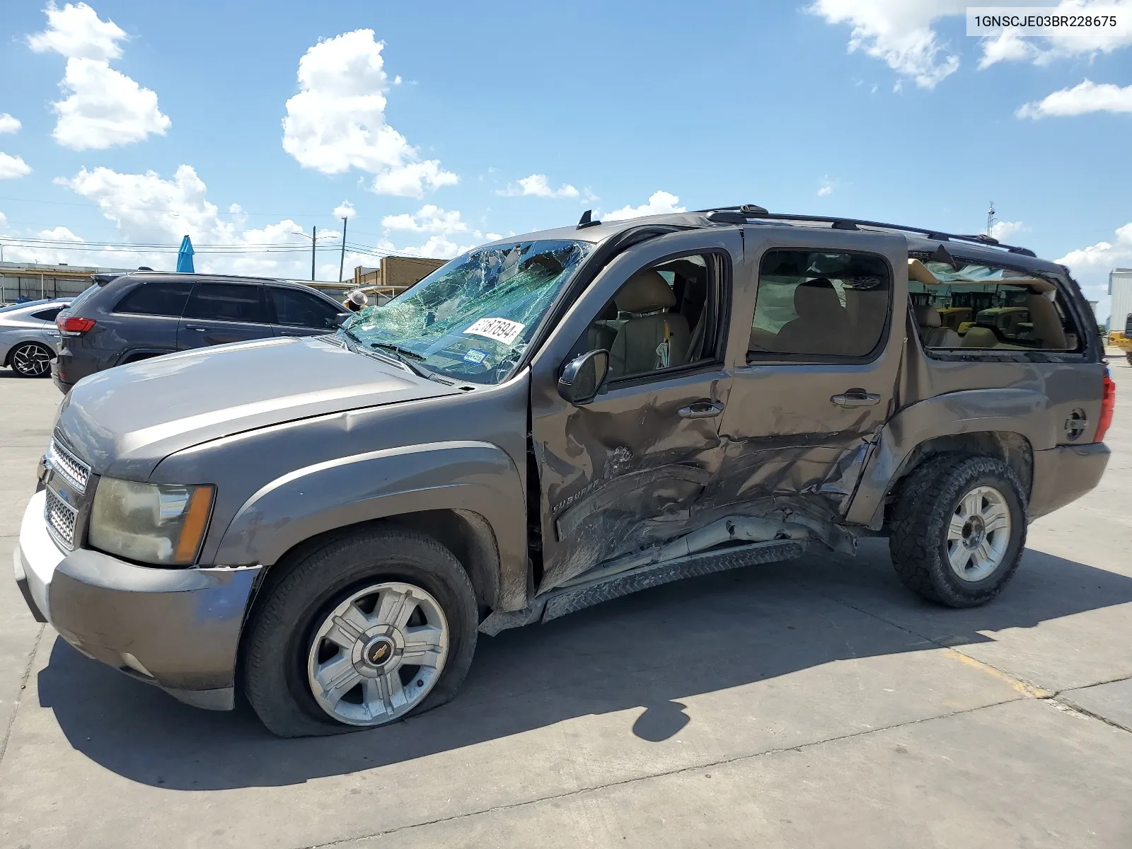 2011 Chevrolet Suburban C1500 Lt VIN: 1GNSCJE03BR228675 Lot: 62187694