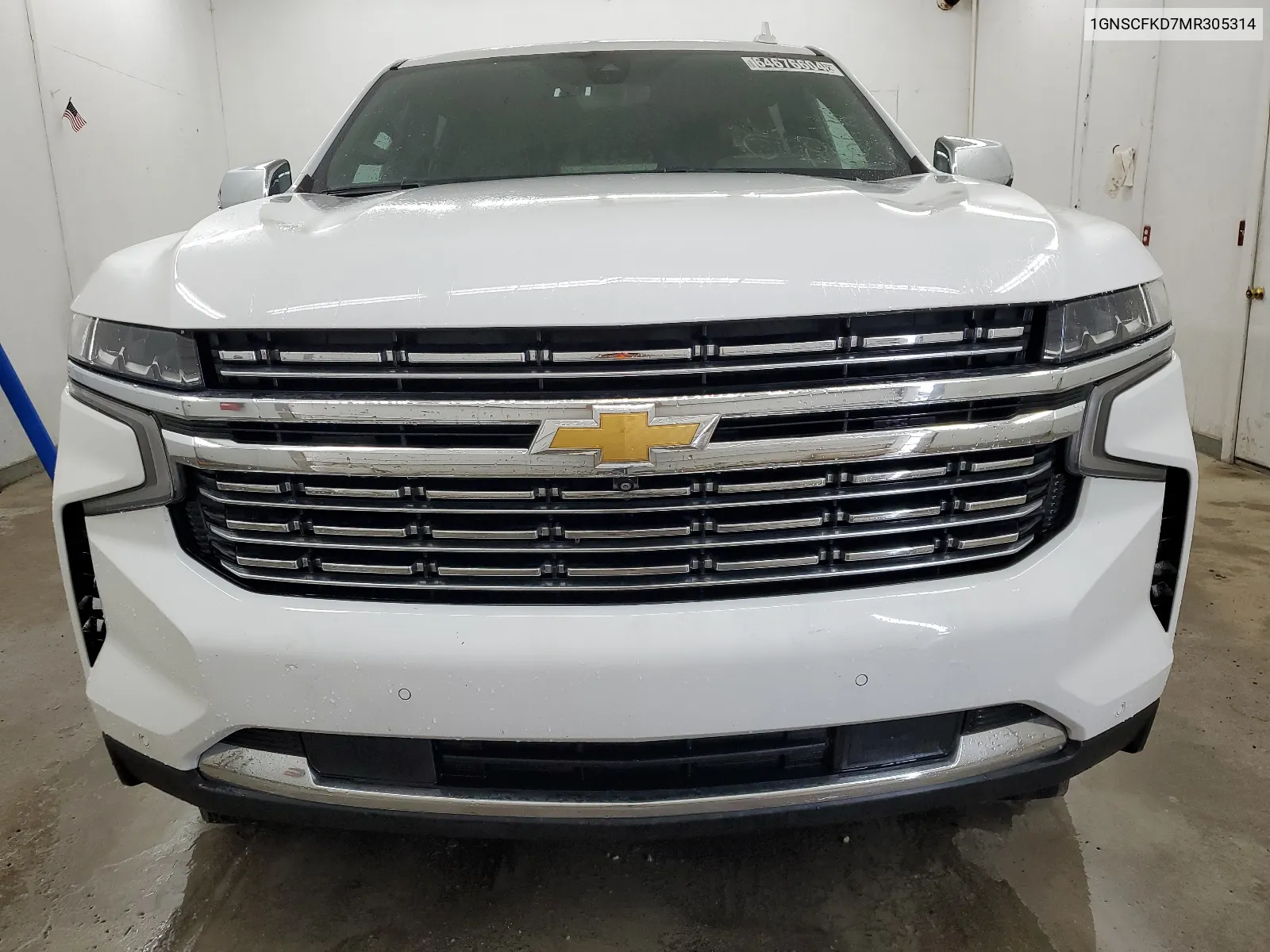 2021 Chevrolet Suburban C1500 Premier VIN: 1GNSCFKD7MR305314 Lot: 64676604