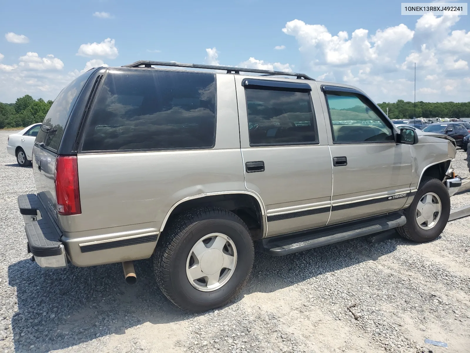 1999 Chevrolet Tahoe K1500 VIN: 1GNEK13R8XJ492241 Lot: 58849224