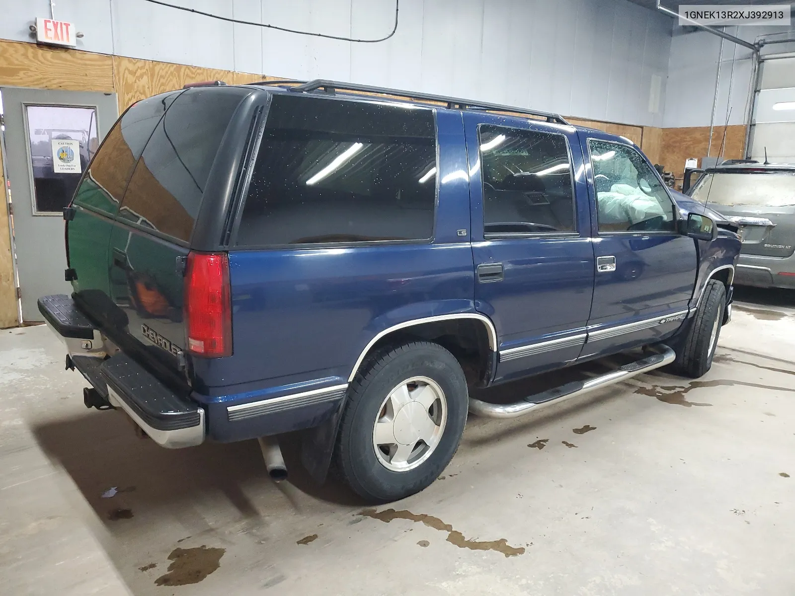 1999 Chevrolet Tahoe K1500 VIN: 1GNEK13R2XJ392913 Lot: 66909704