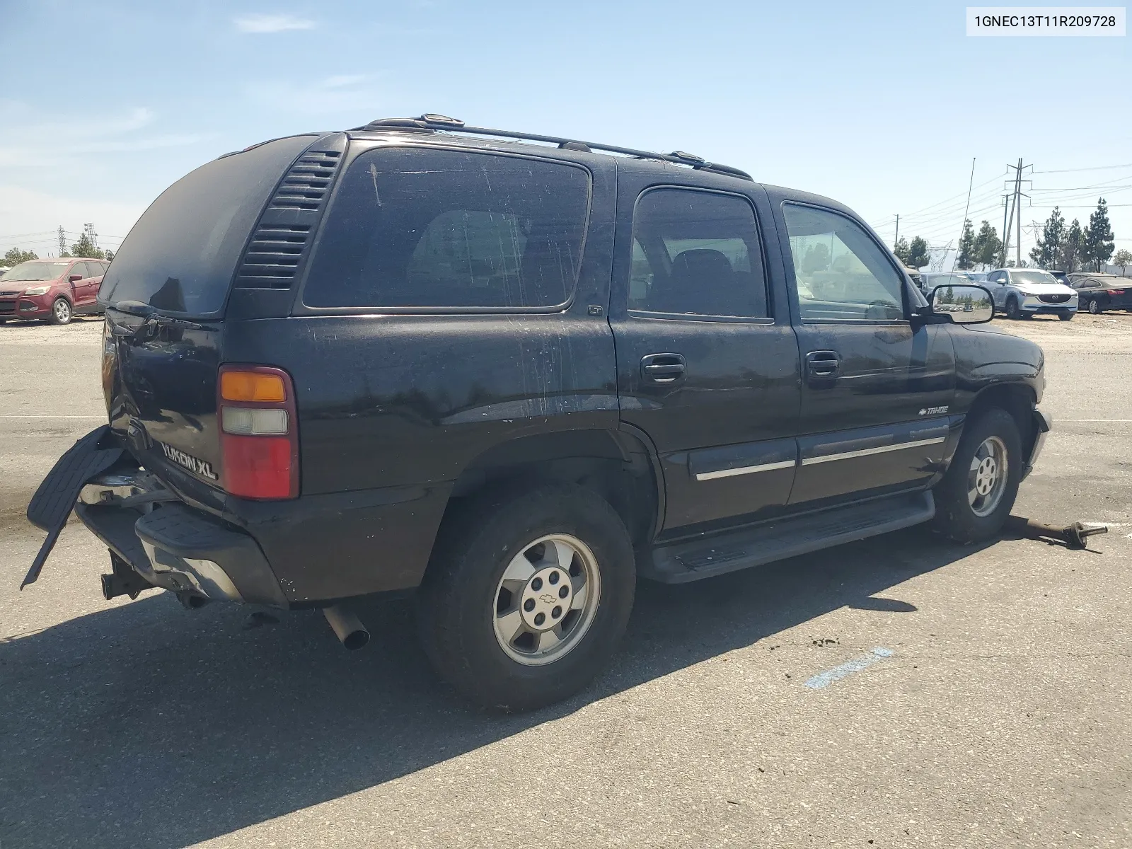 2001 Chevrolet Tahoe C1500 VIN: 1GNEC13T11R209728 Lot: 66196604