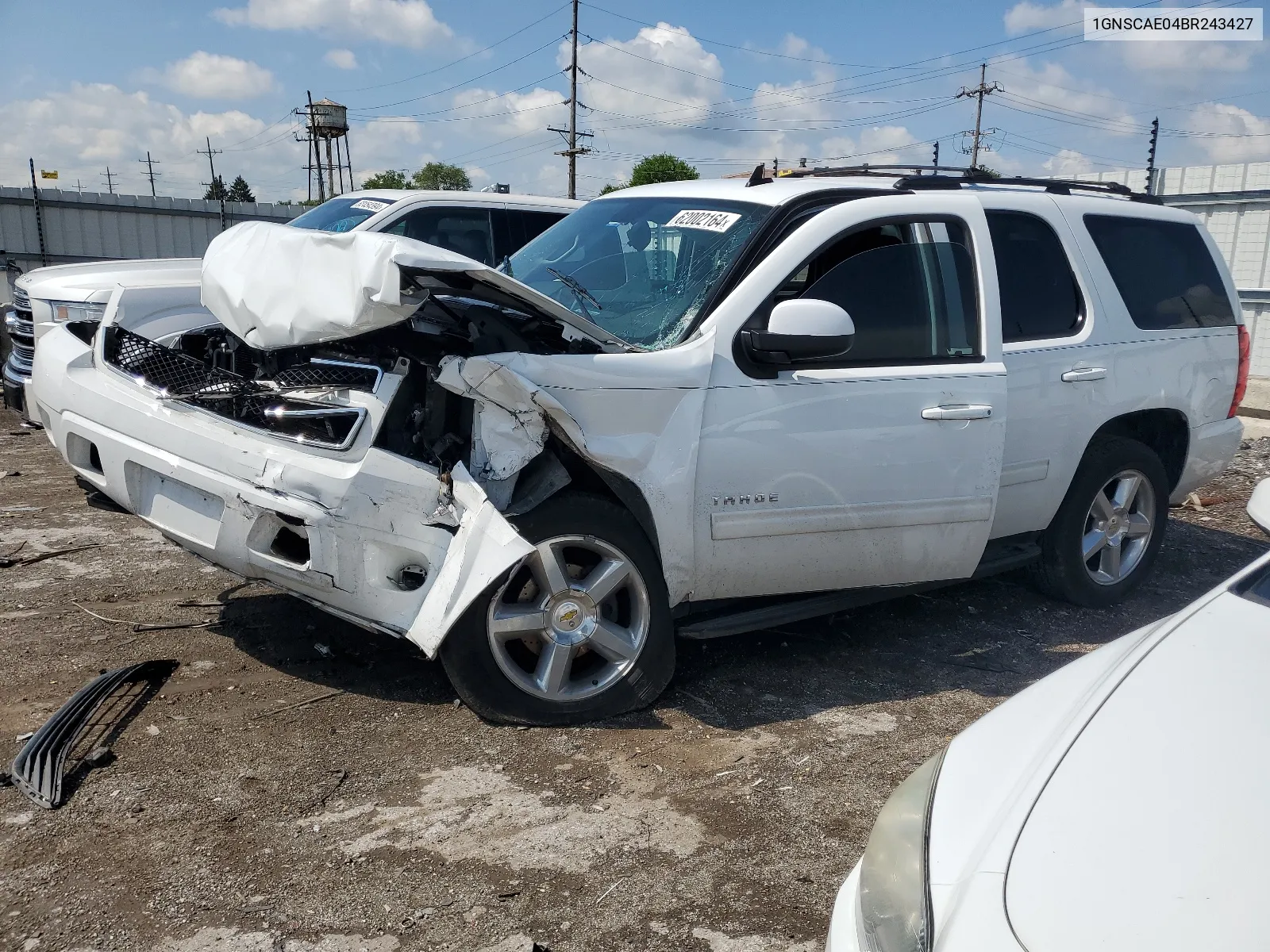 2011 Chevrolet Tahoe C1500 Ls VIN: 1GNSCAE04BR243427 Lot: 62002164