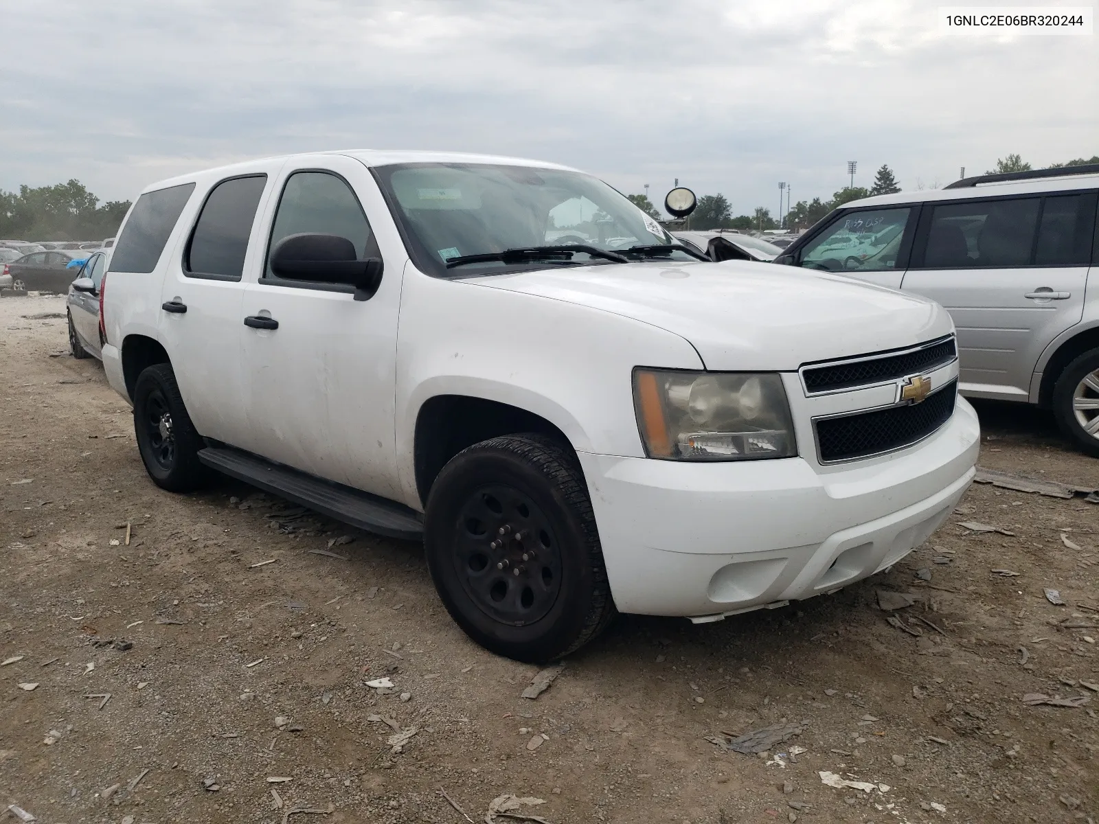 2011 Chevrolet Tahoe Police VIN: 1GNLC2E06BR320244 Lot: 63969444