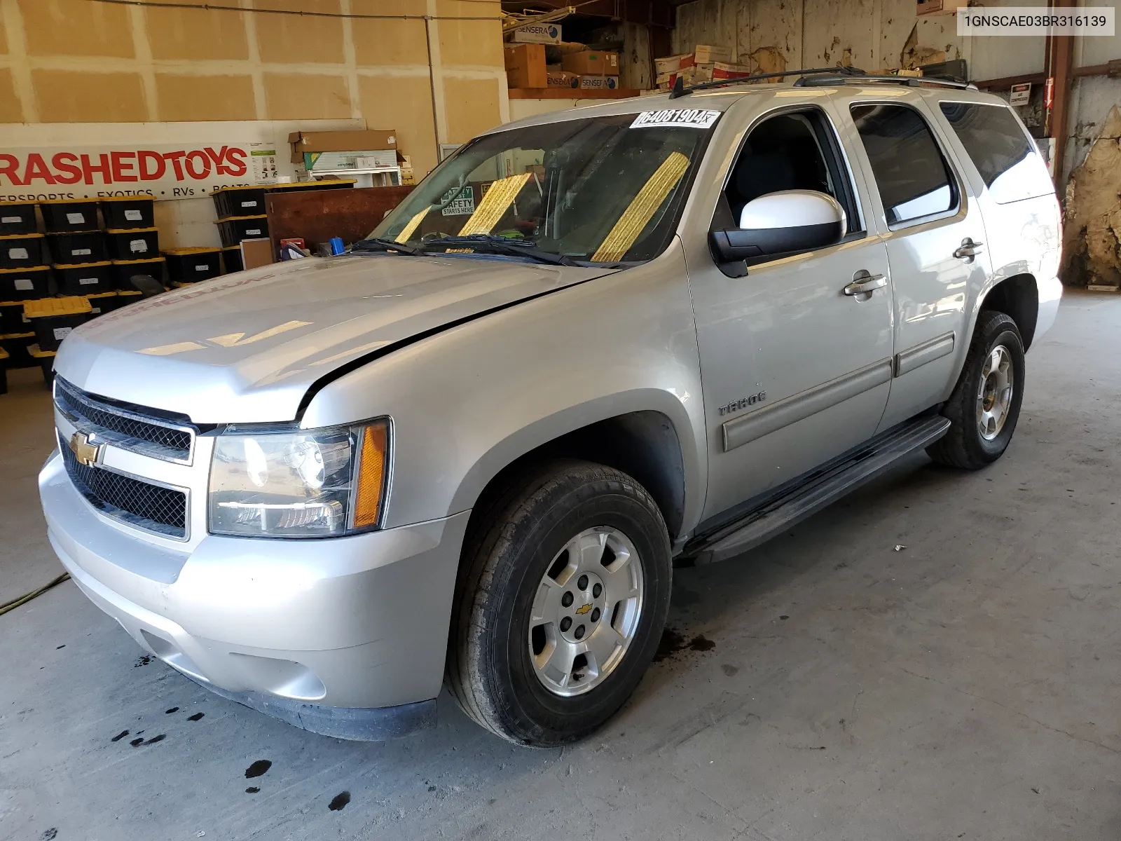 2011 Chevrolet Tahoe C1500 Ls VIN: 1GNSCAE03BR316139 Lot: 64081904