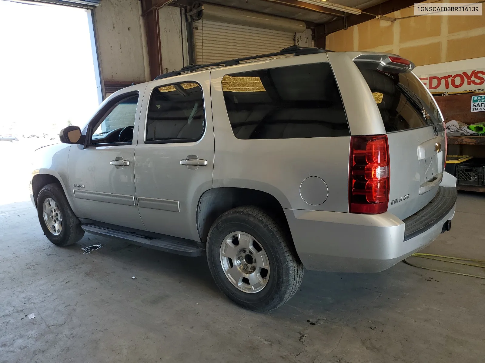 2011 Chevrolet Tahoe C1500 Ls VIN: 1GNSCAE03BR316139 Lot: 64081904