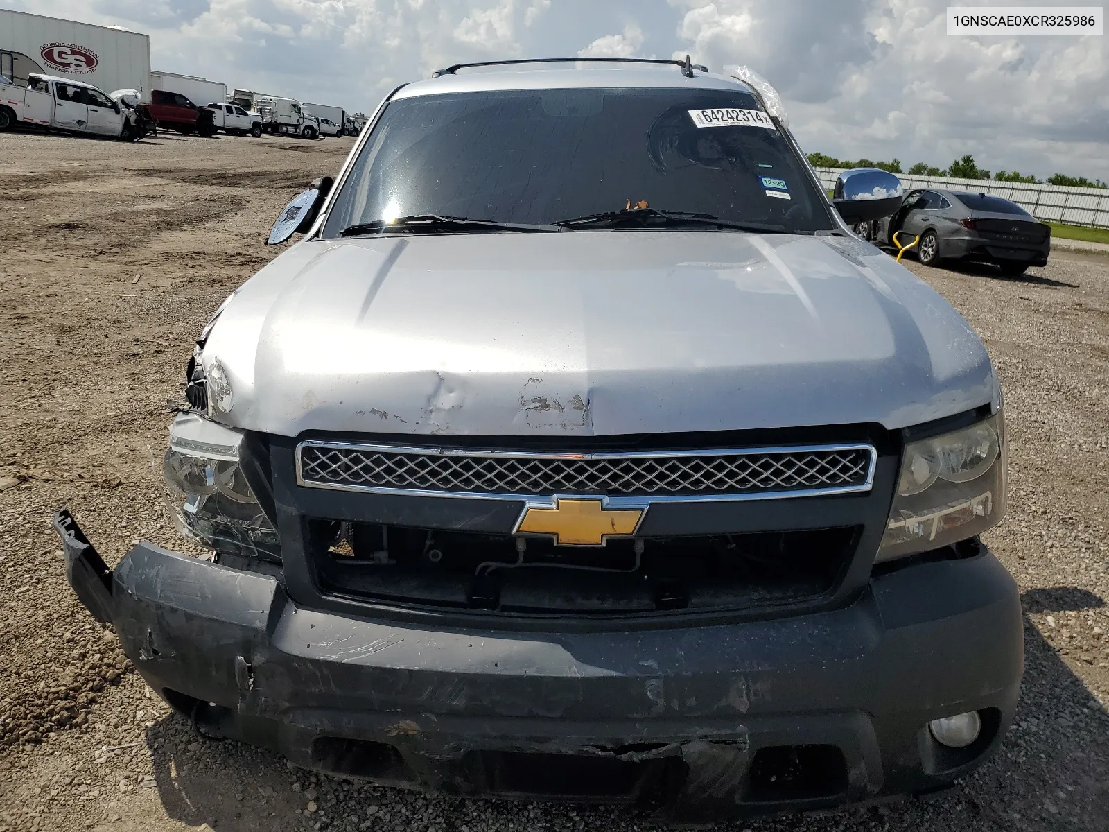 2012 Chevrolet Tahoe C1500 Ls VIN: 1GNSCAE0XCR325986 Lot: 64242314