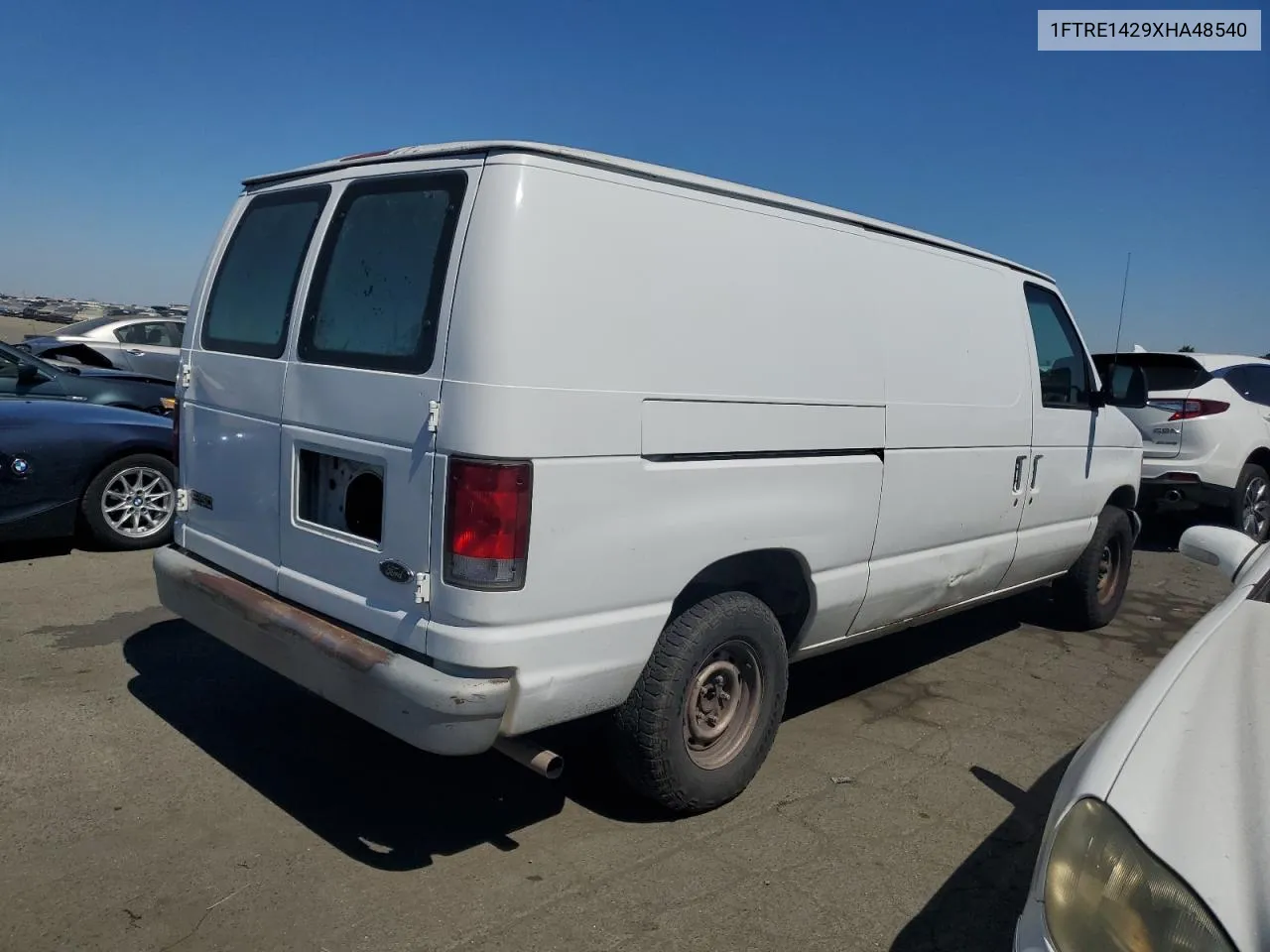 1999 Ford Econoline E150 Van VIN: 1FTRE1429XHA48540 Lot: 70322344