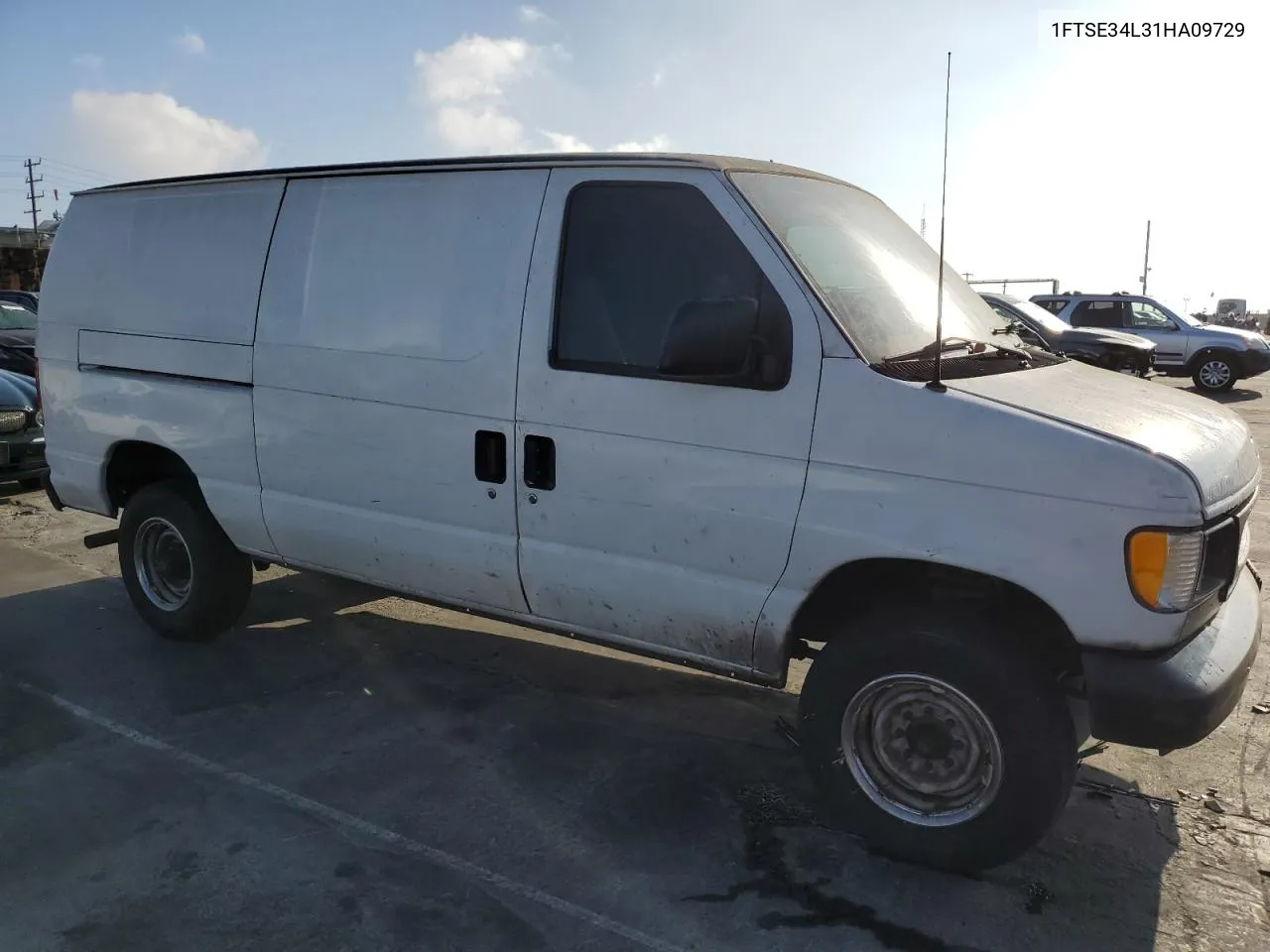 2001 Ford Econoline E350 Super Duty Van VIN: 1FTSE34L31HA09729 Lot: 68820404