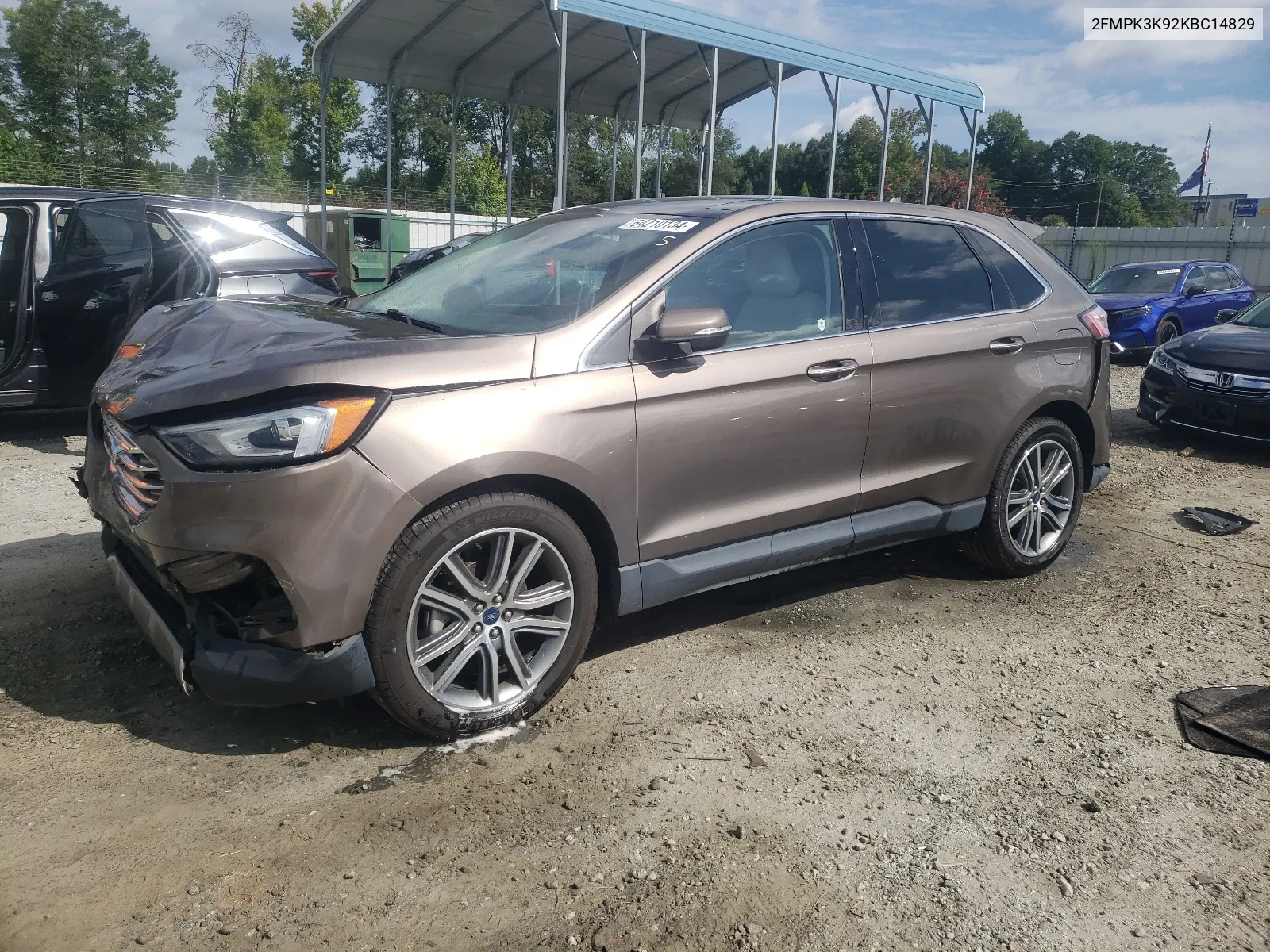 2019 Ford Edge Titanium VIN: 2FMPK3K92KBC14829 Lot: 64210134