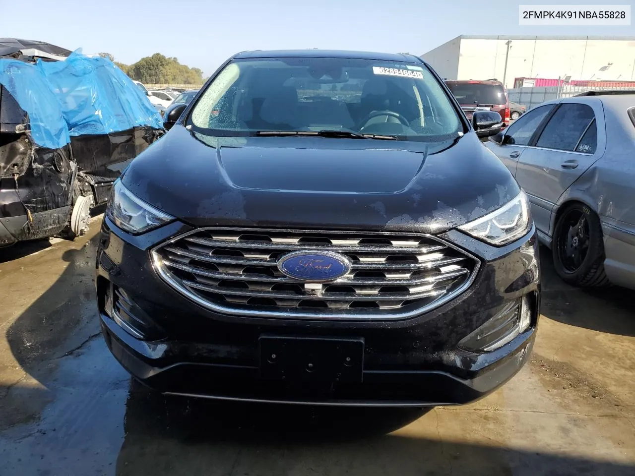 2022 Ford Edge Titanium VIN: 2FMPK4K91NBA55828 Lot: 62894664