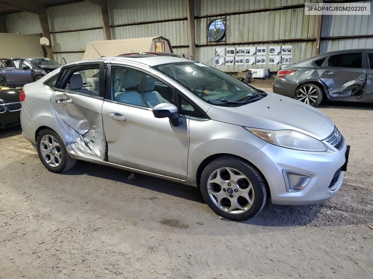 2013 Ford Fiesta Titanium VIN: 3FADP4CJ8DM202201 Lot: 69728834