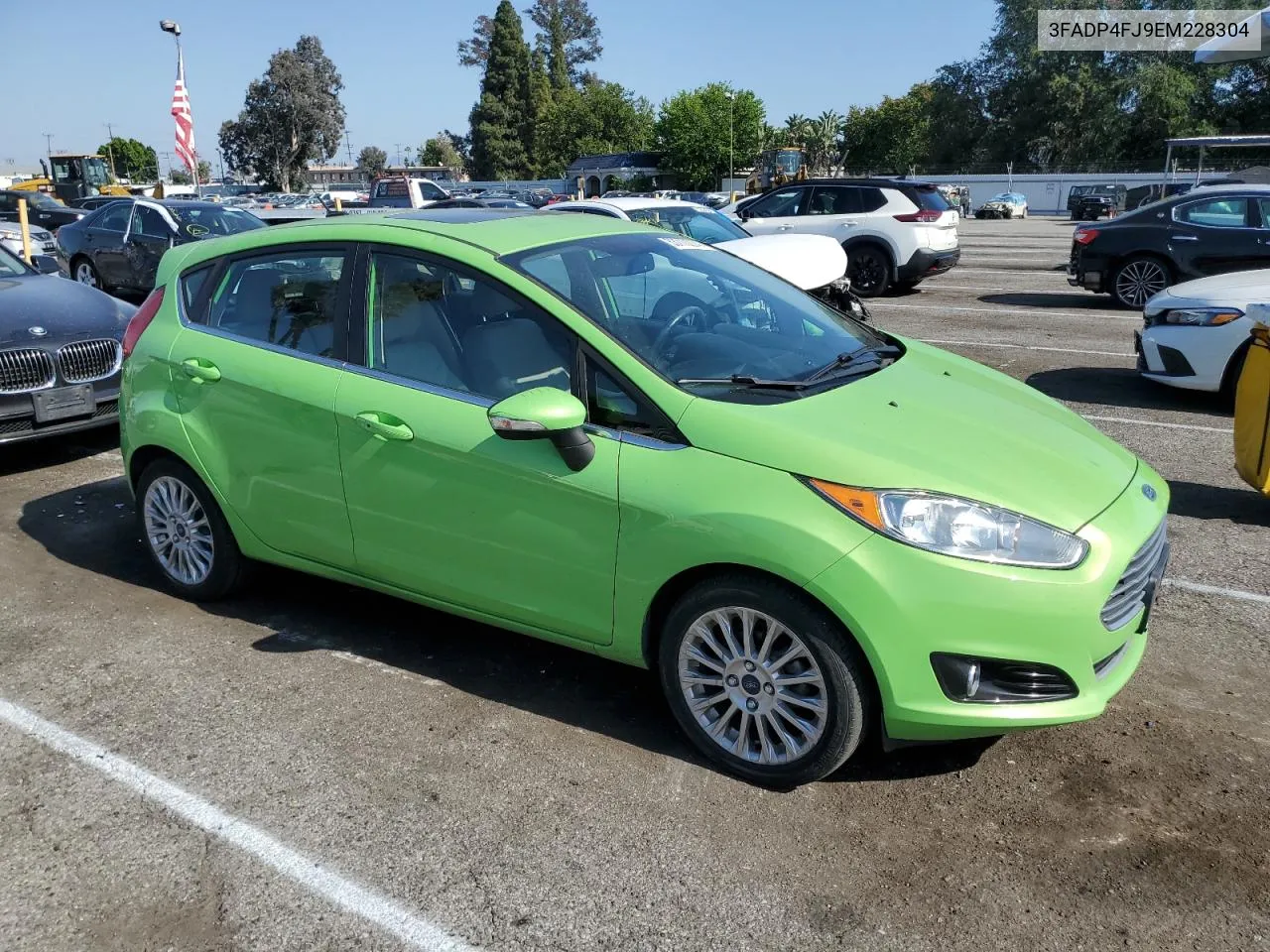 2014 Ford Fiesta Titanium VIN: 3FADP4FJ9EM228304 Lot: 53710274