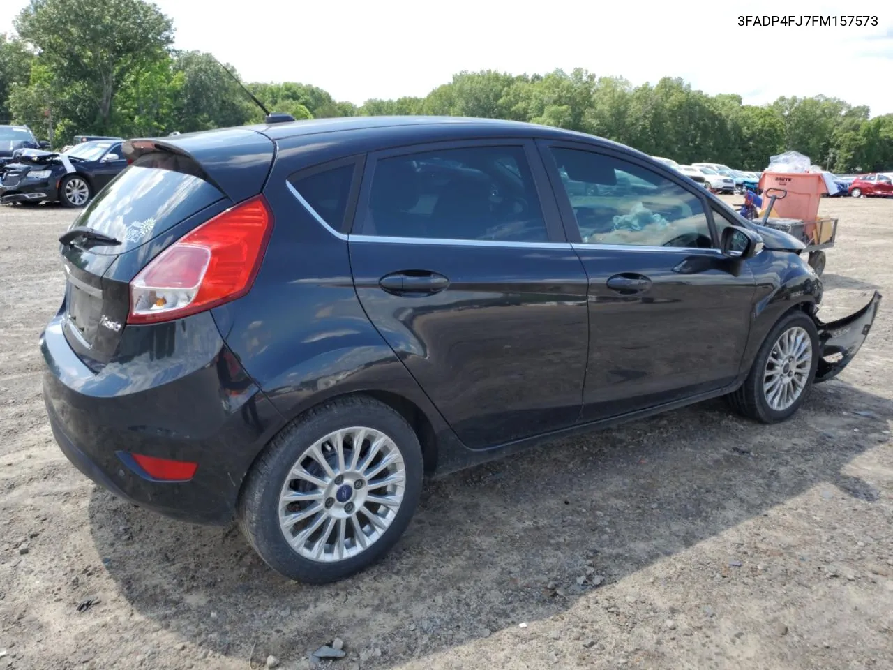 2015 Ford Fiesta Titanium VIN: 3FADP4FJ7FM157573 Lot: 55216434