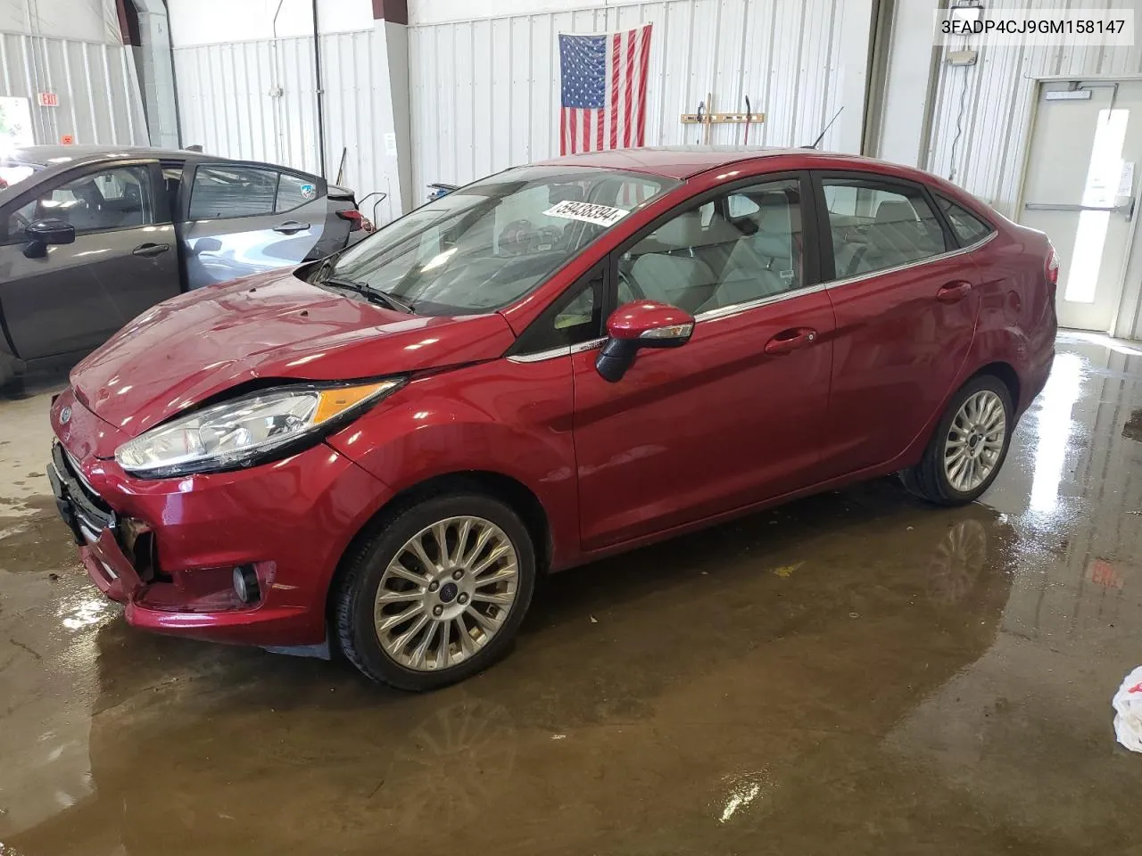 2016 Ford Fiesta Titanium VIN: 3FADP4CJ9GM158147 Lot: 59438394