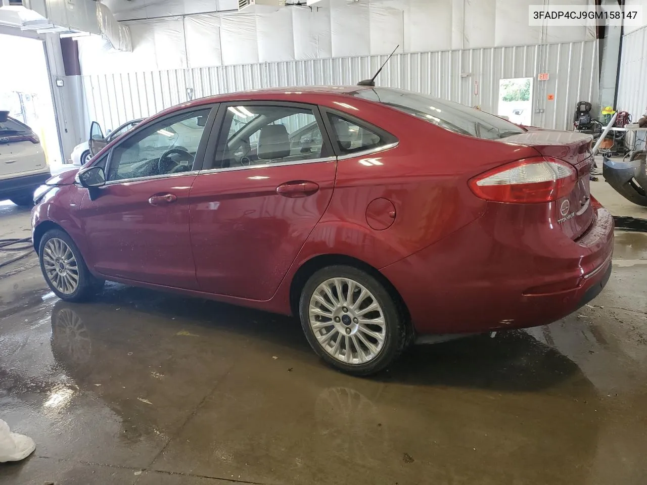 2016 Ford Fiesta Titanium VIN: 3FADP4CJ9GM158147 Lot: 59438394