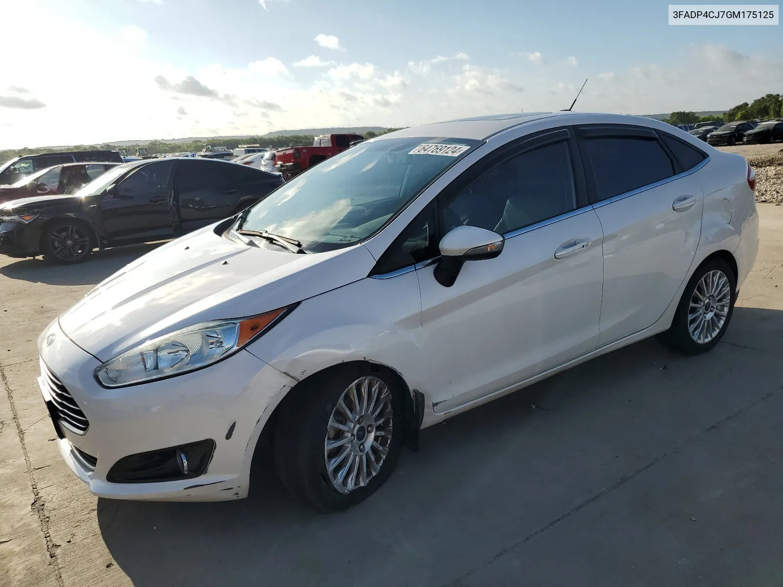 2016 Ford Fiesta Titanium VIN: 3FADP4CJ7GM175125 Lot: 64769124