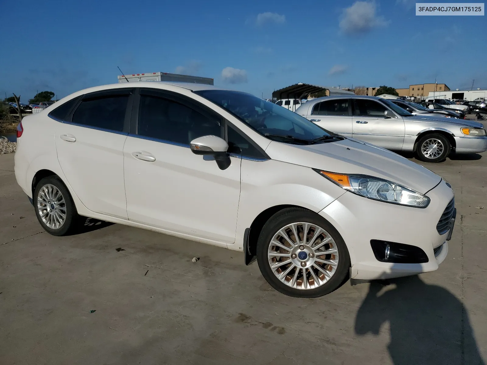 2016 Ford Fiesta Titanium VIN: 3FADP4CJ7GM175125 Lot: 64769124