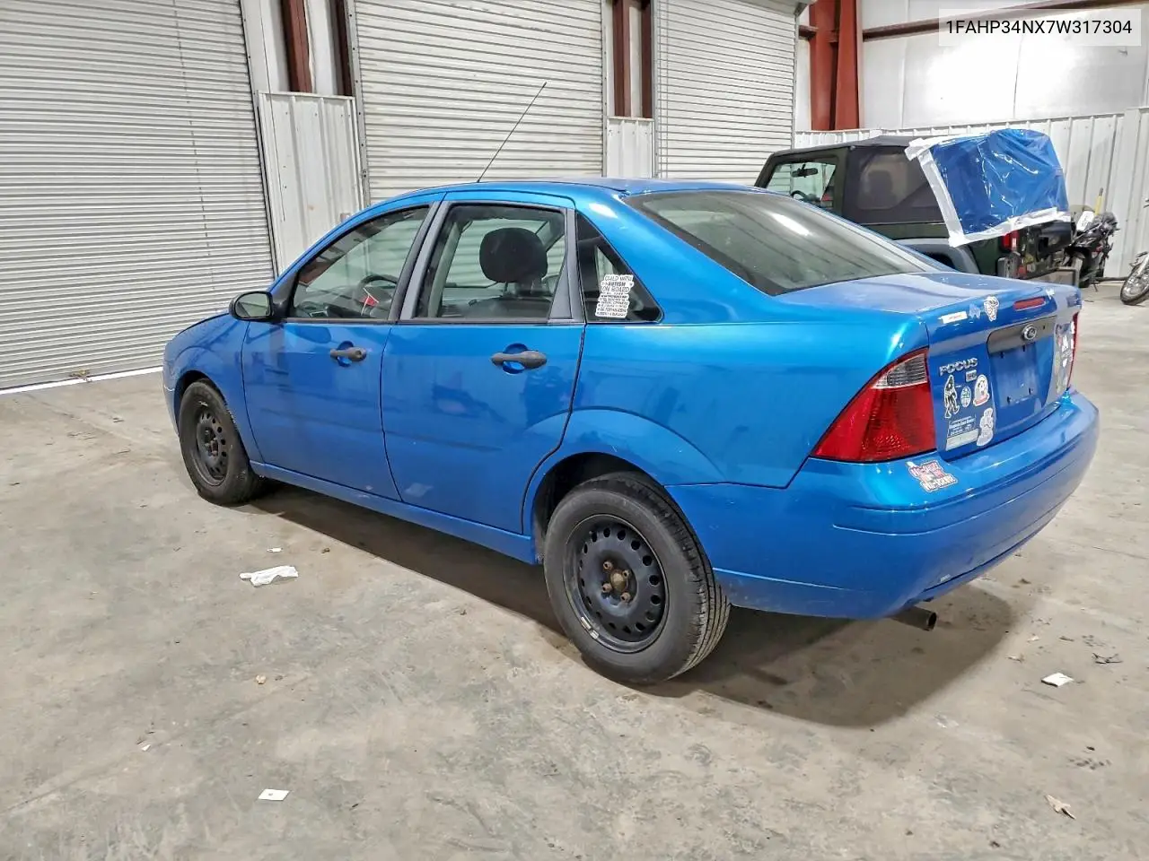 1FAHP34NX7W317304 2007 Ford Focus Zx4