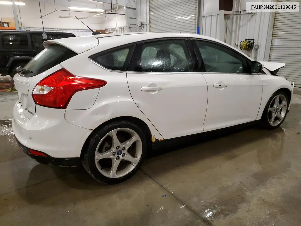 1FAHP3N28CL139845 2012 Ford Focus Titanium