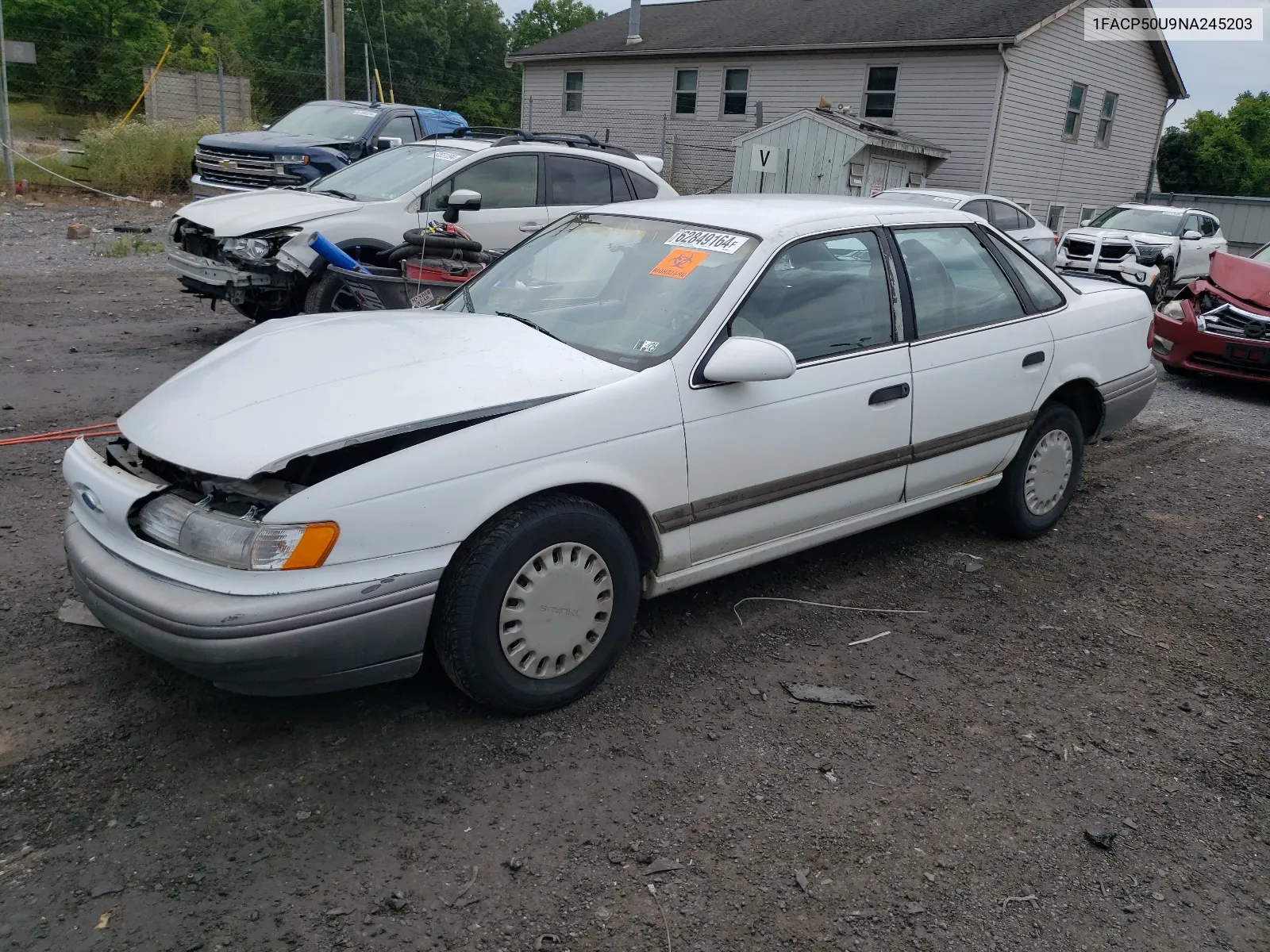 1992 Ford Taurus L VIN: 1FACP50U9NA245203 Lot: 62849164