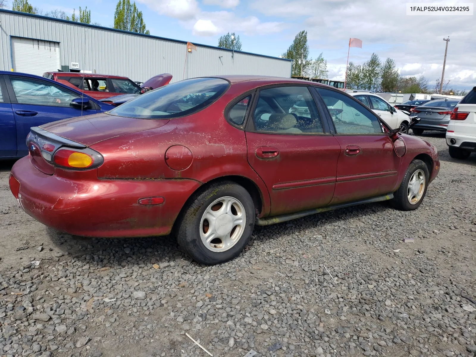 1997 Ford Taurus Gl VIN: 1FALP52U4VG234295 Lot: 51112714