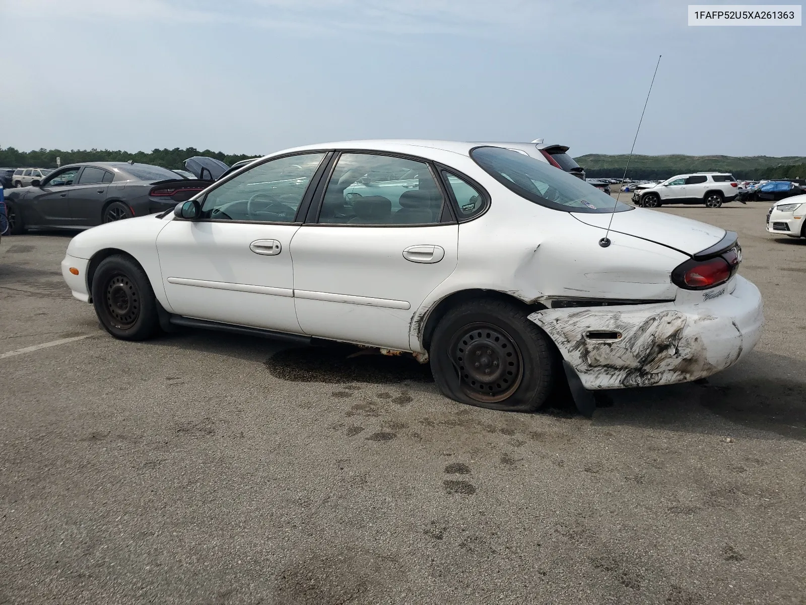 1999 Ford Taurus Lx VIN: 1FAFP52U5XA261363 Lot: 63695384