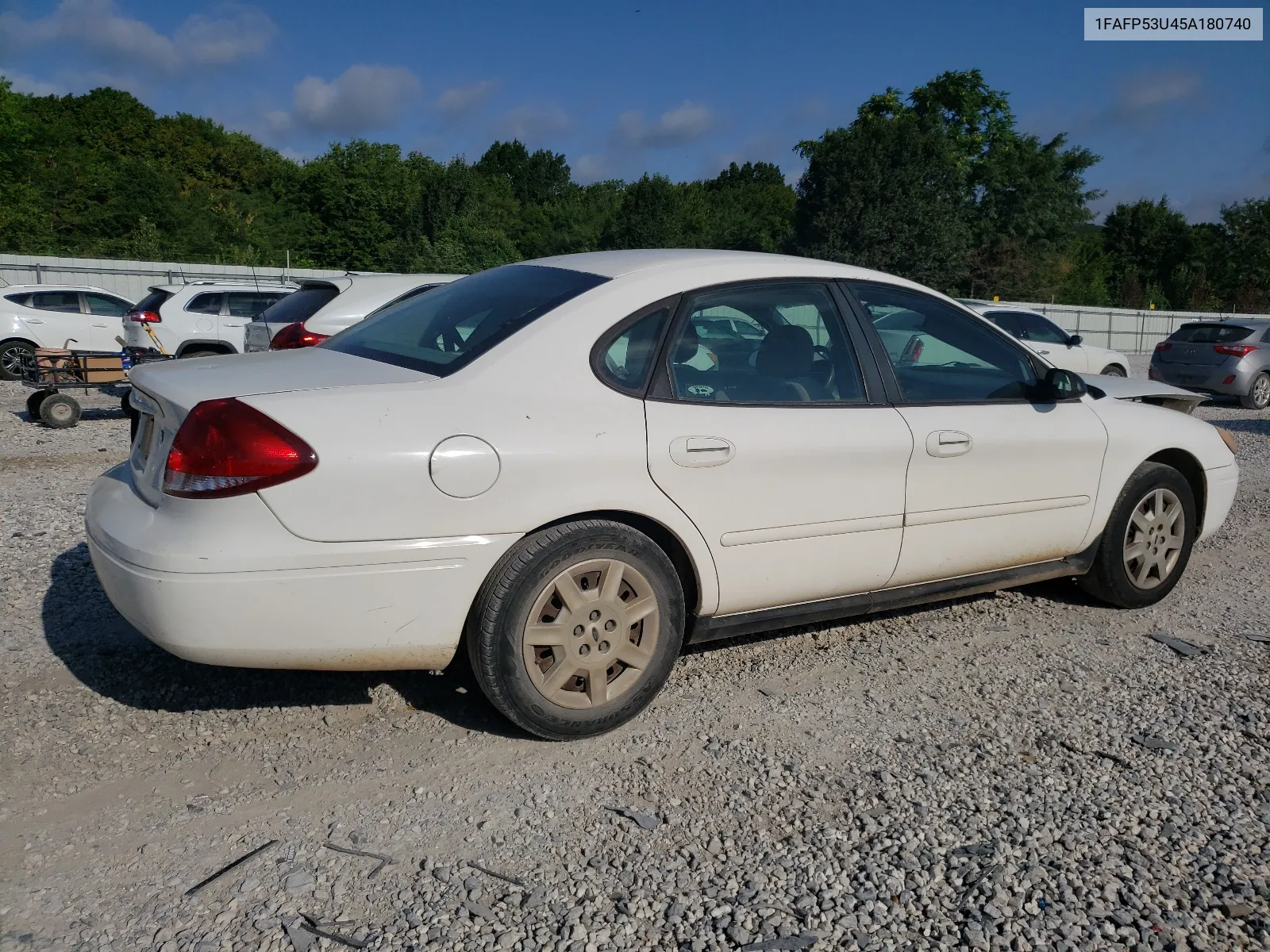 2005 Ford Taurus Se VIN: 1FAFP53U45A180740 Lot: 64889234