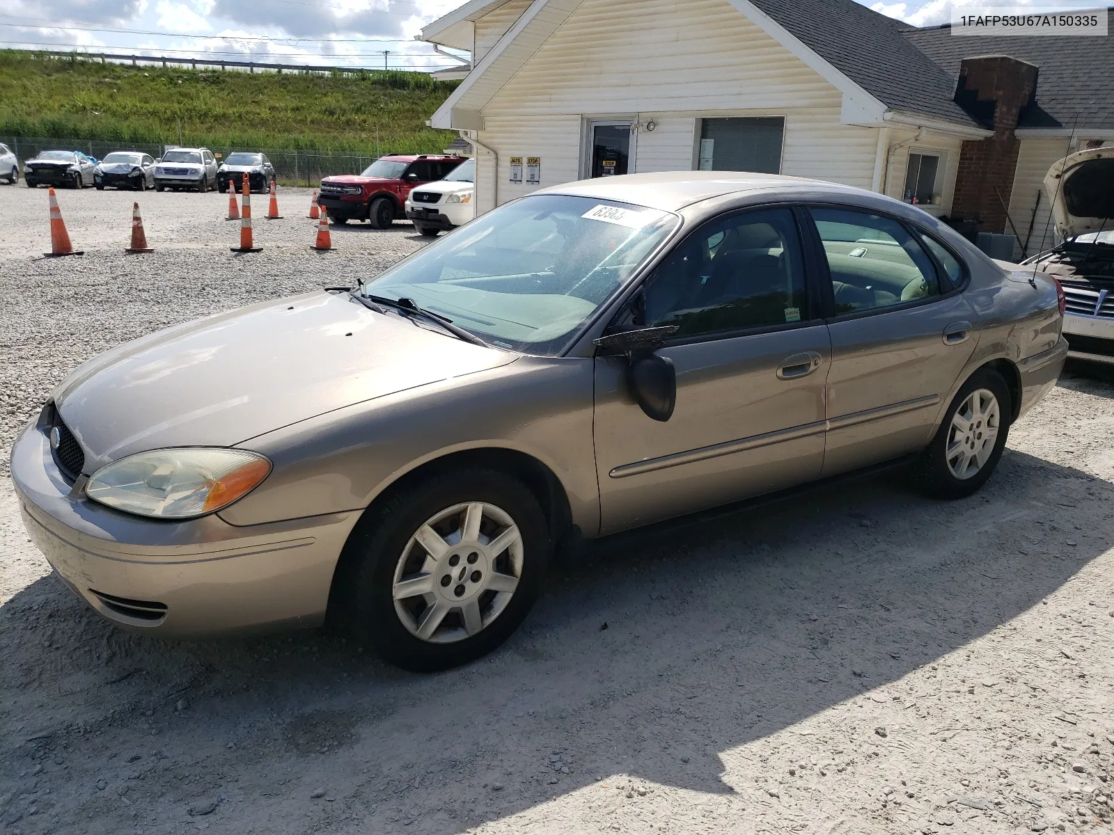 2007 Ford Taurus Se VIN: 1FAFP53U67A150335 Lot: 63900474