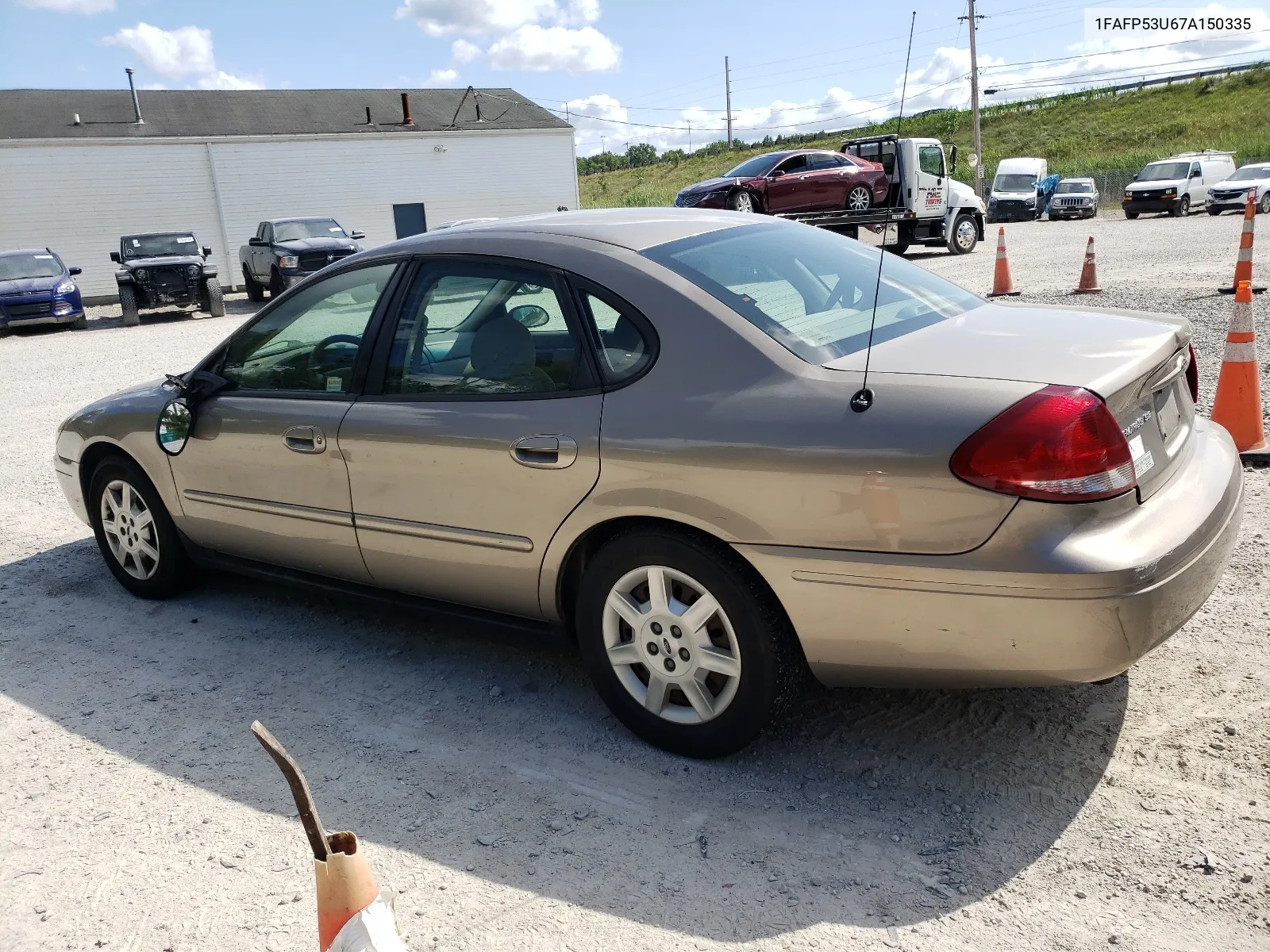 2007 Ford Taurus Se VIN: 1FAFP53U67A150335 Lot: 63900474