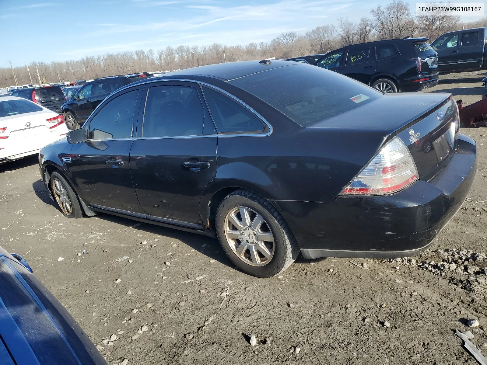 2009 Ford Taurus Se VIN: 1FAHP23W99G108167 Lot: 49186344