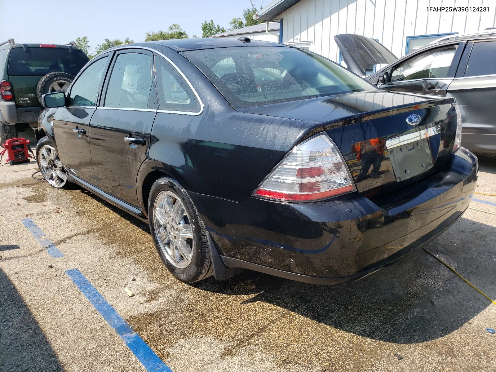 2009 Ford Taurus Limited VIN: 1FAHP25W39G124281 Lot: 64992964