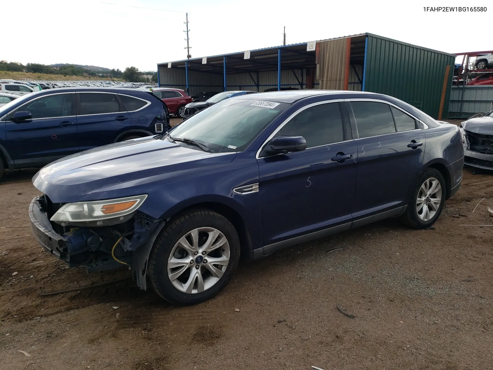 2011 Ford Taurus Sel VIN: 1FAHP2EW1BG165580 Lot: 63657094