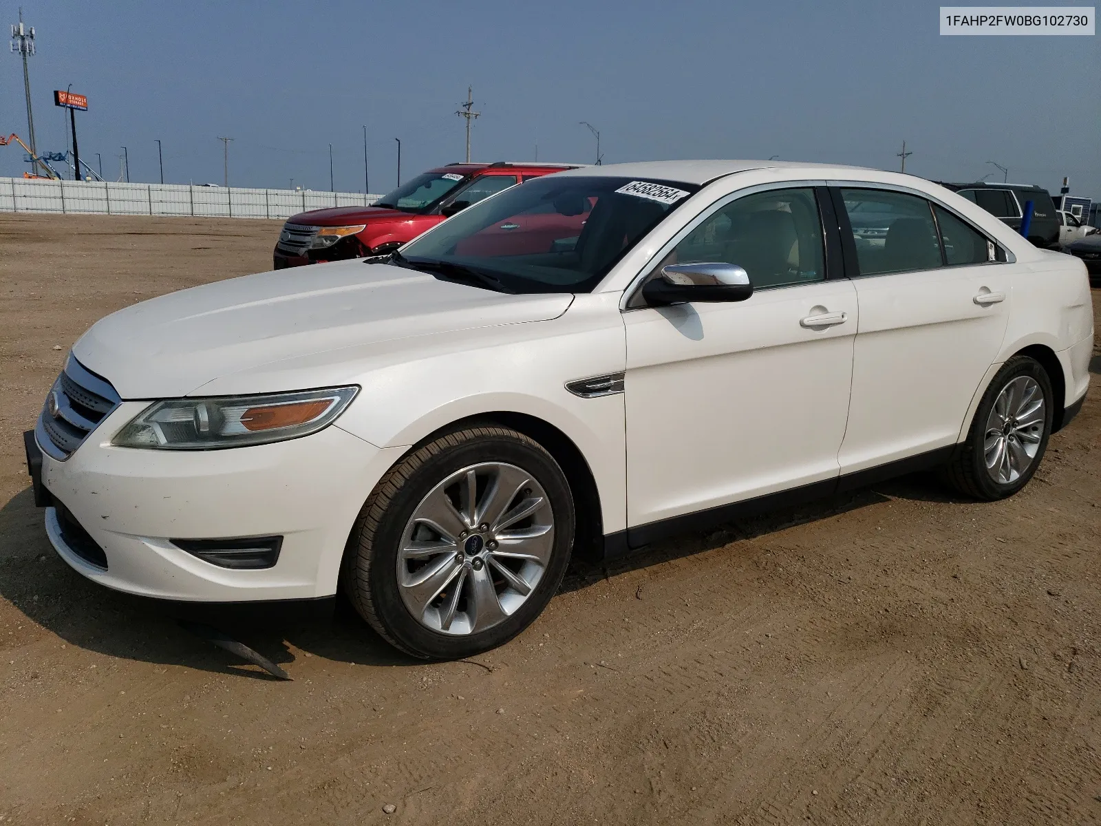 2011 Ford Taurus Limited VIN: 1FAHP2FW0BG102730 Lot: 64582564