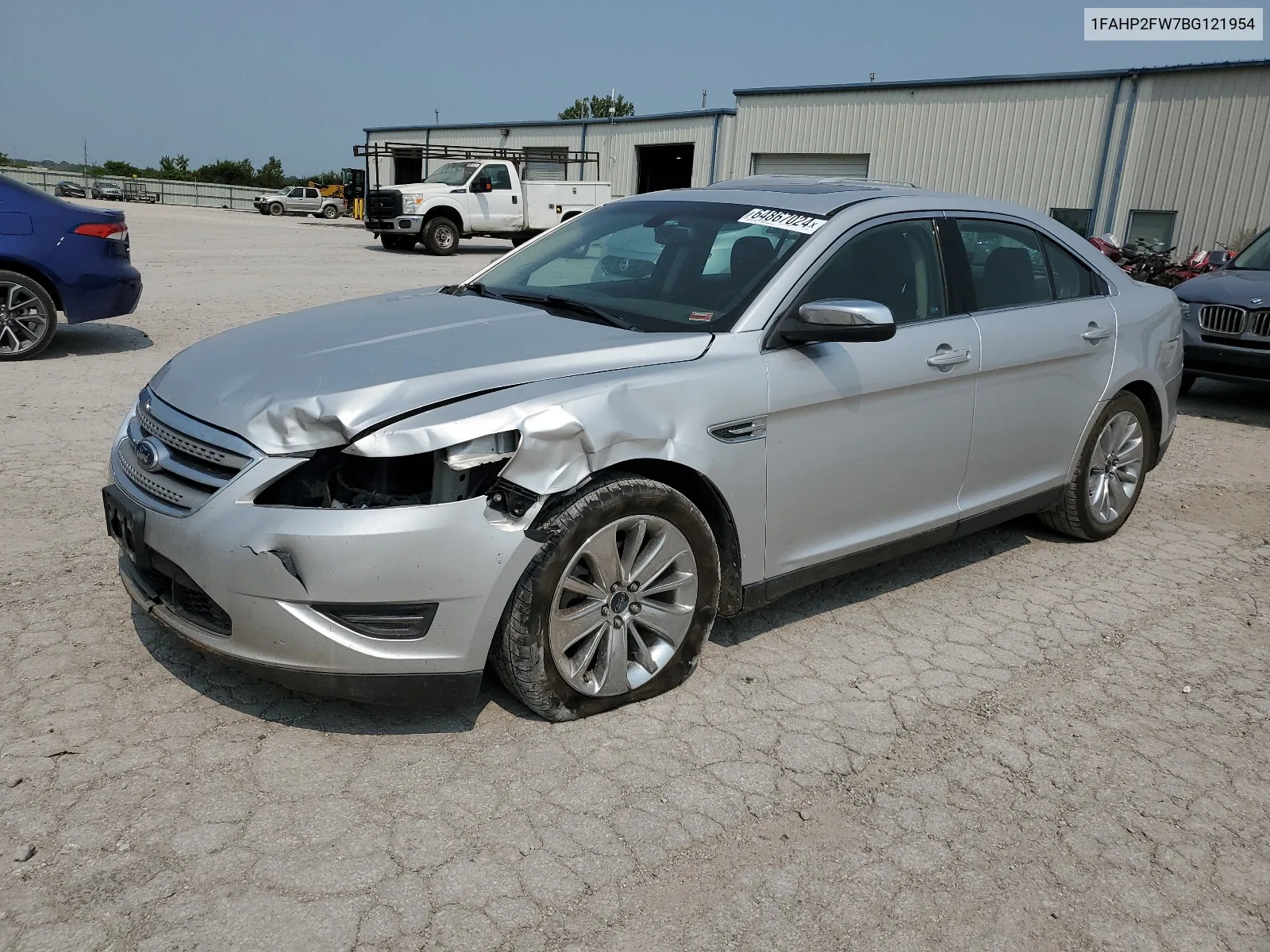 2011 Ford Taurus Limited VIN: 1FAHP2FW7BG121954 Lot: 64867024