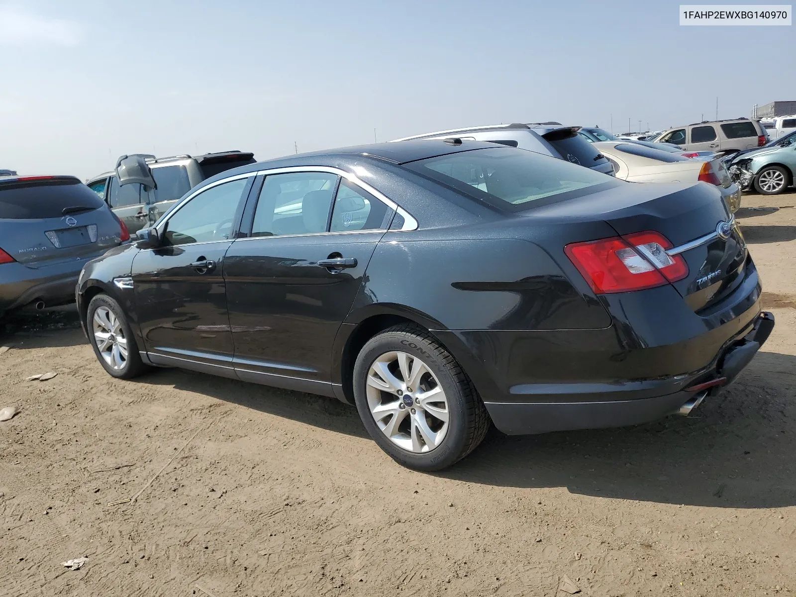 2011 Ford Taurus Sel VIN: 1FAHP2EWXBG140970 Lot: 64870804