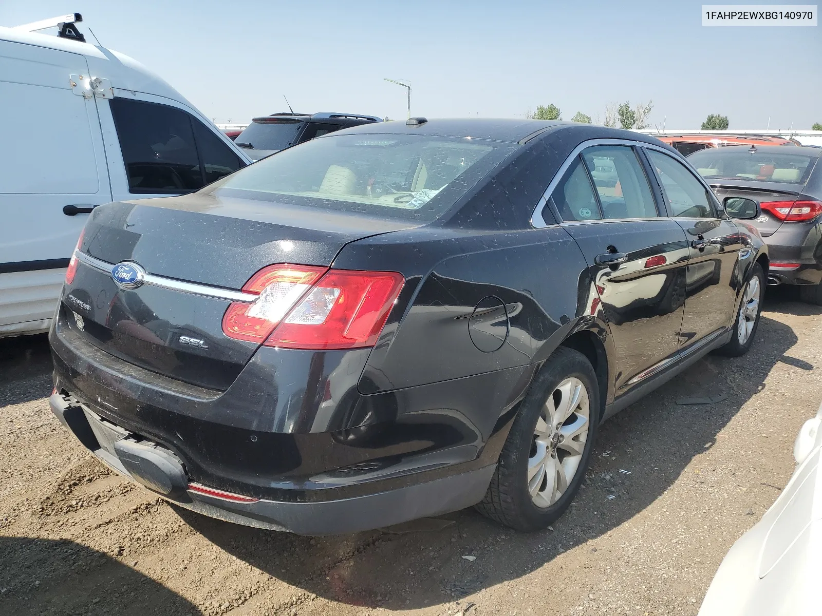 2011 Ford Taurus Sel VIN: 1FAHP2EWXBG140970 Lot: 64870804