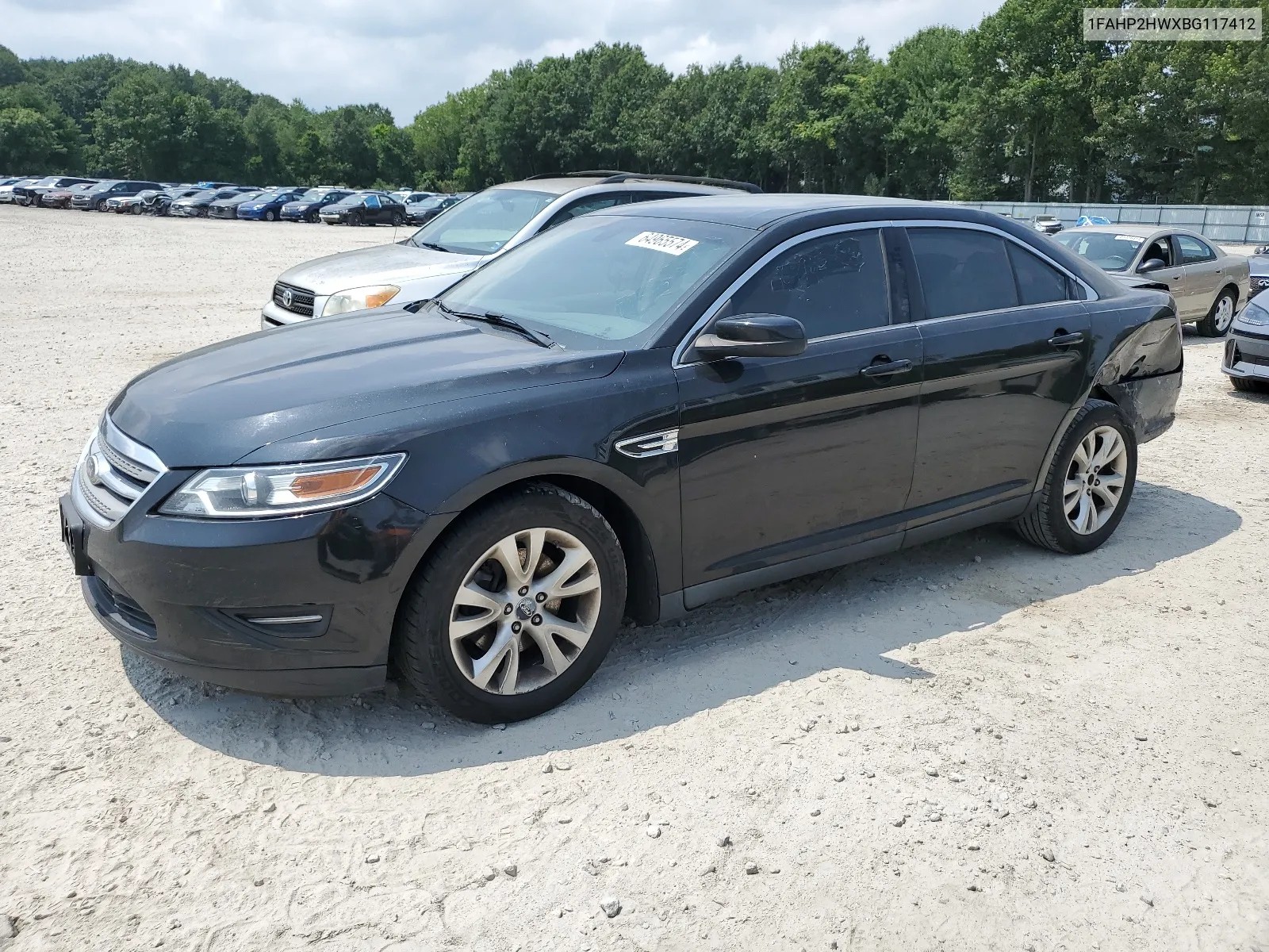 2011 Ford Taurus Sel VIN: 1FAHP2HWXBG117412 Lot: 64965574