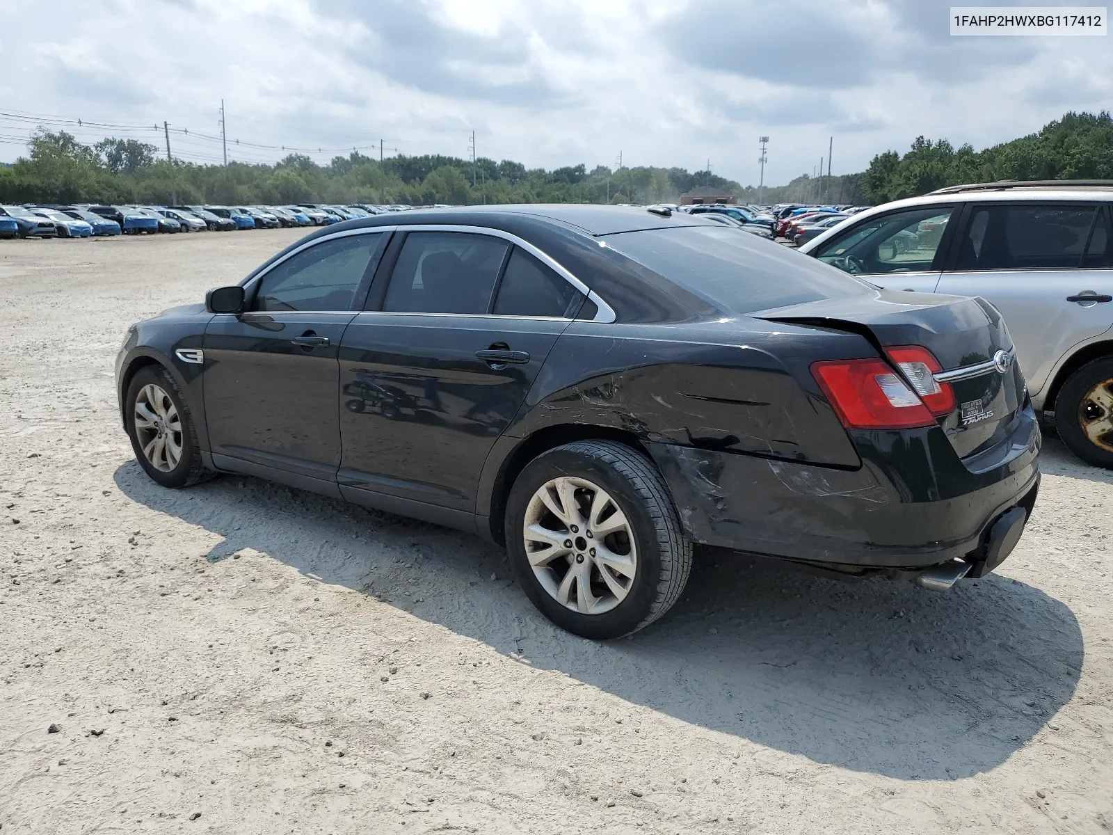 2011 Ford Taurus Sel VIN: 1FAHP2HWXBG117412 Lot: 64965574