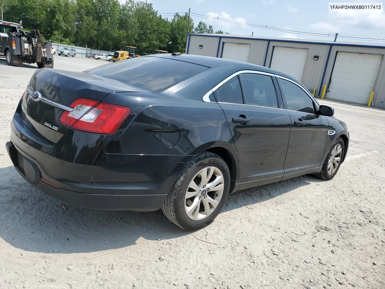 2011 Ford Taurus Sel VIN: 1FAHP2HWXBG117412 Lot: 64965574