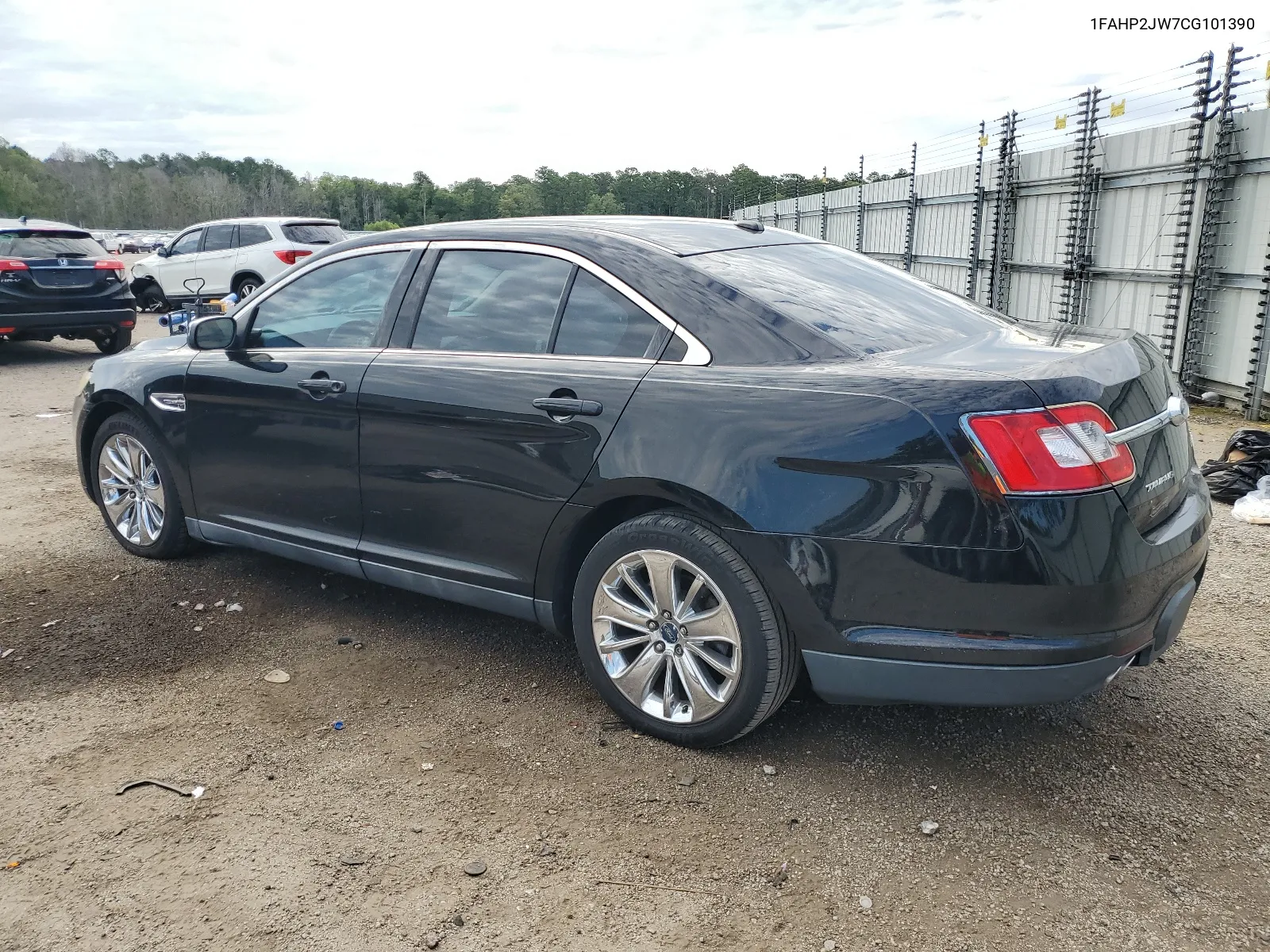 2012 Ford Taurus Limited VIN: 1FAHP2JW7CG101390 Lot: 63062554