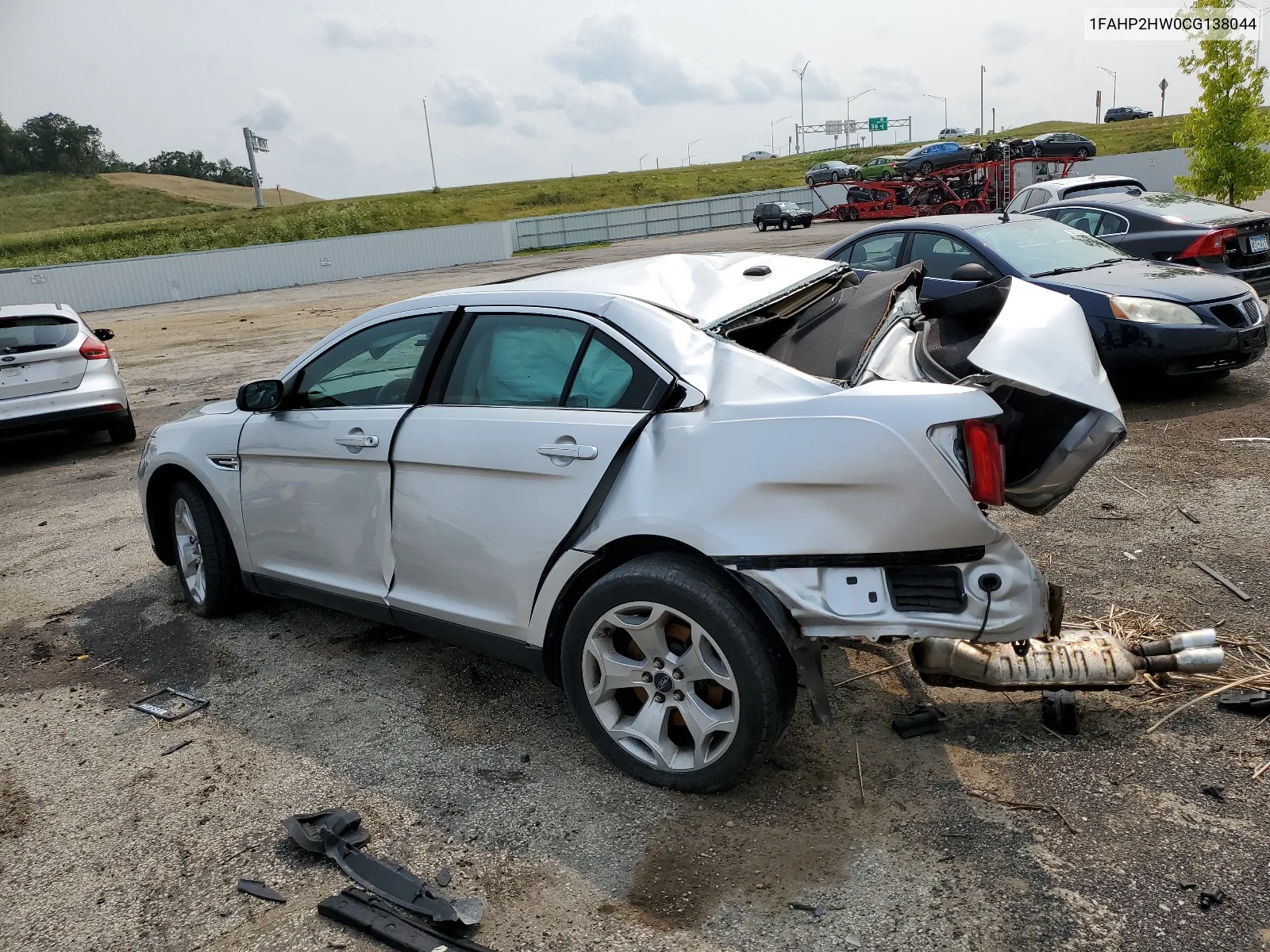 2012 Ford Taurus Sel VIN: 1FAHP2HW0CG138044 Lot: 64101814