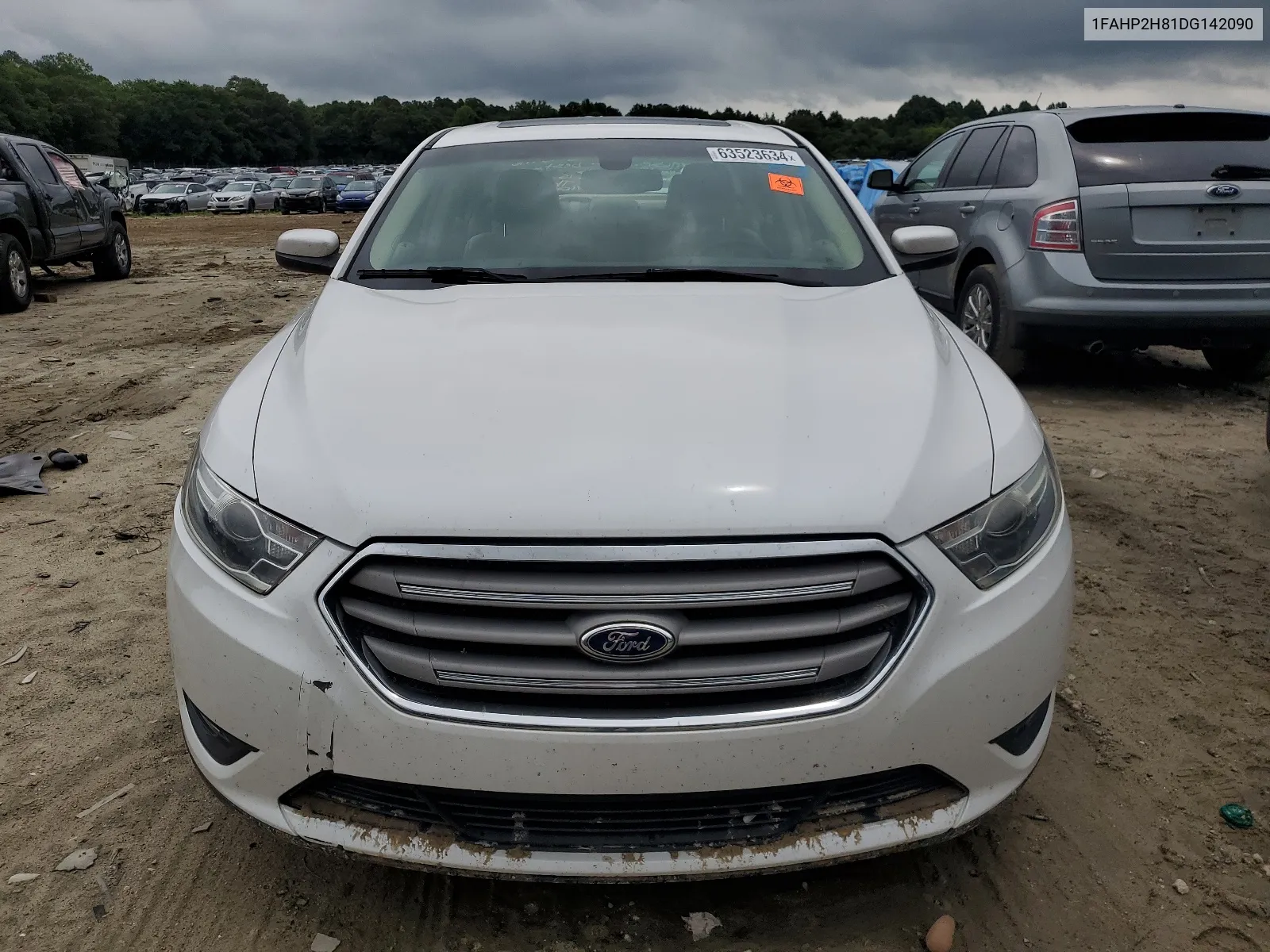 2013 Ford Taurus Sel VIN: 1FAHP2H81DG142090 Lot: 63523634