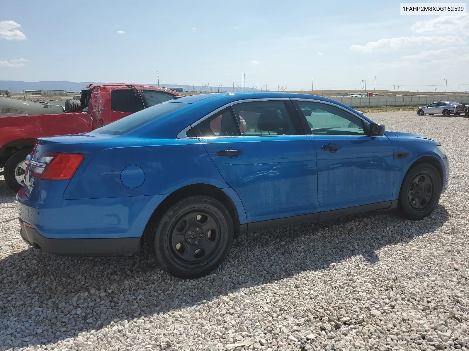 2013 Ford Taurus Police Interceptor VIN: 1FAHP2M8XDG162599 Lot: 65145944