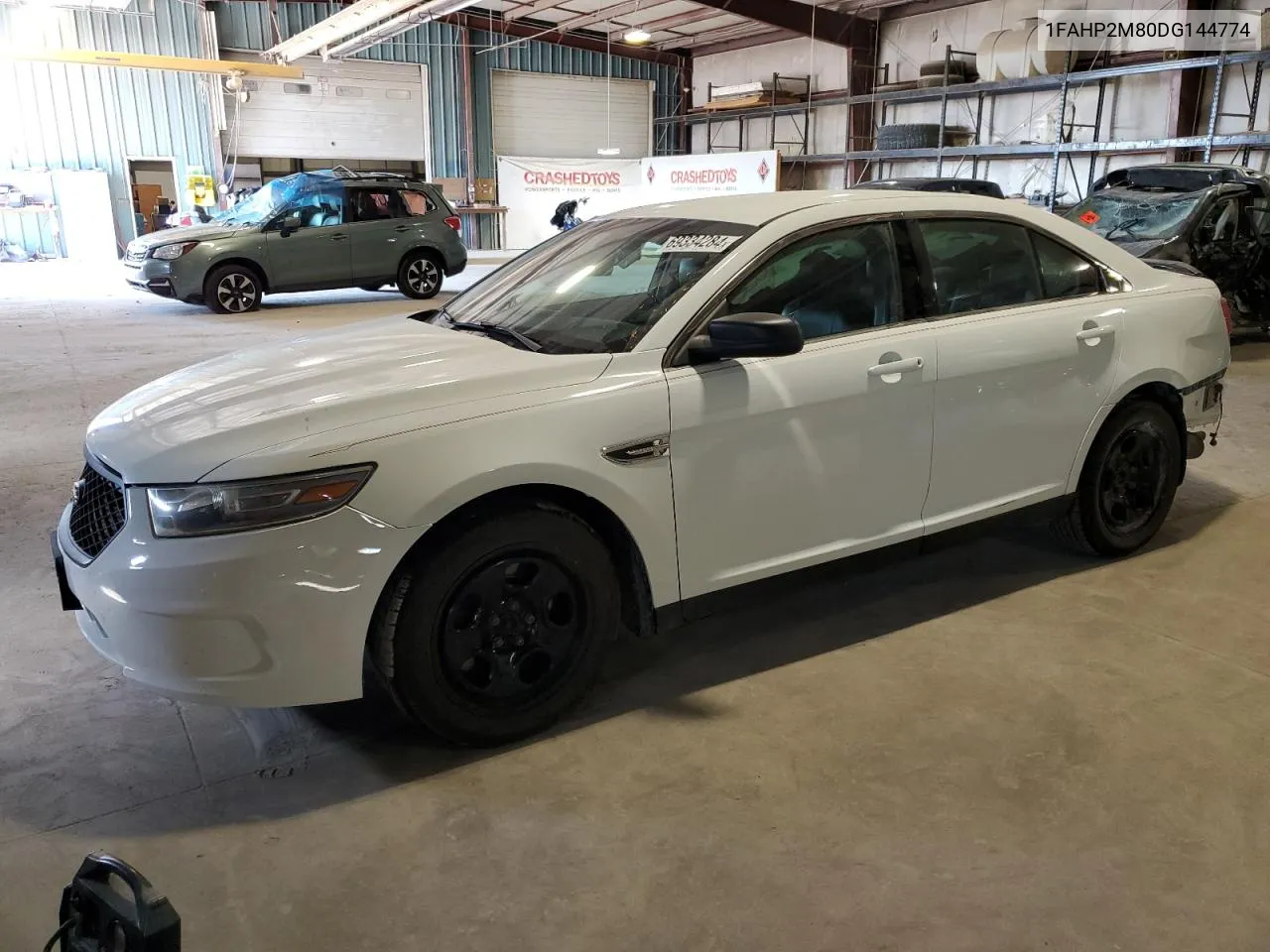 2013 Ford Taurus Police Interceptor VIN: 1FAHP2M80DG144774 Lot: 69334284