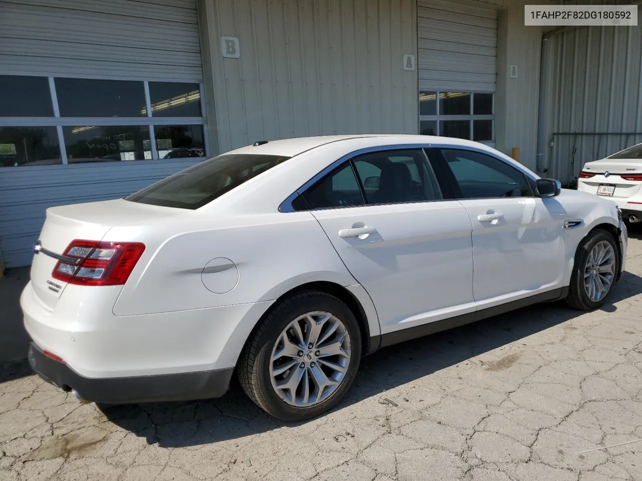 2013 Ford Taurus Limited VIN: 1FAHP2F82DG180592 Lot: 69956644