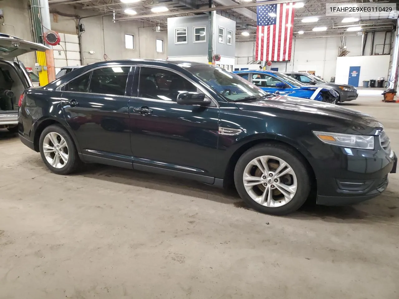 2014 Ford Taurus Sel VIN: 1FAHP2E9XEG110429 Lot: 51386004